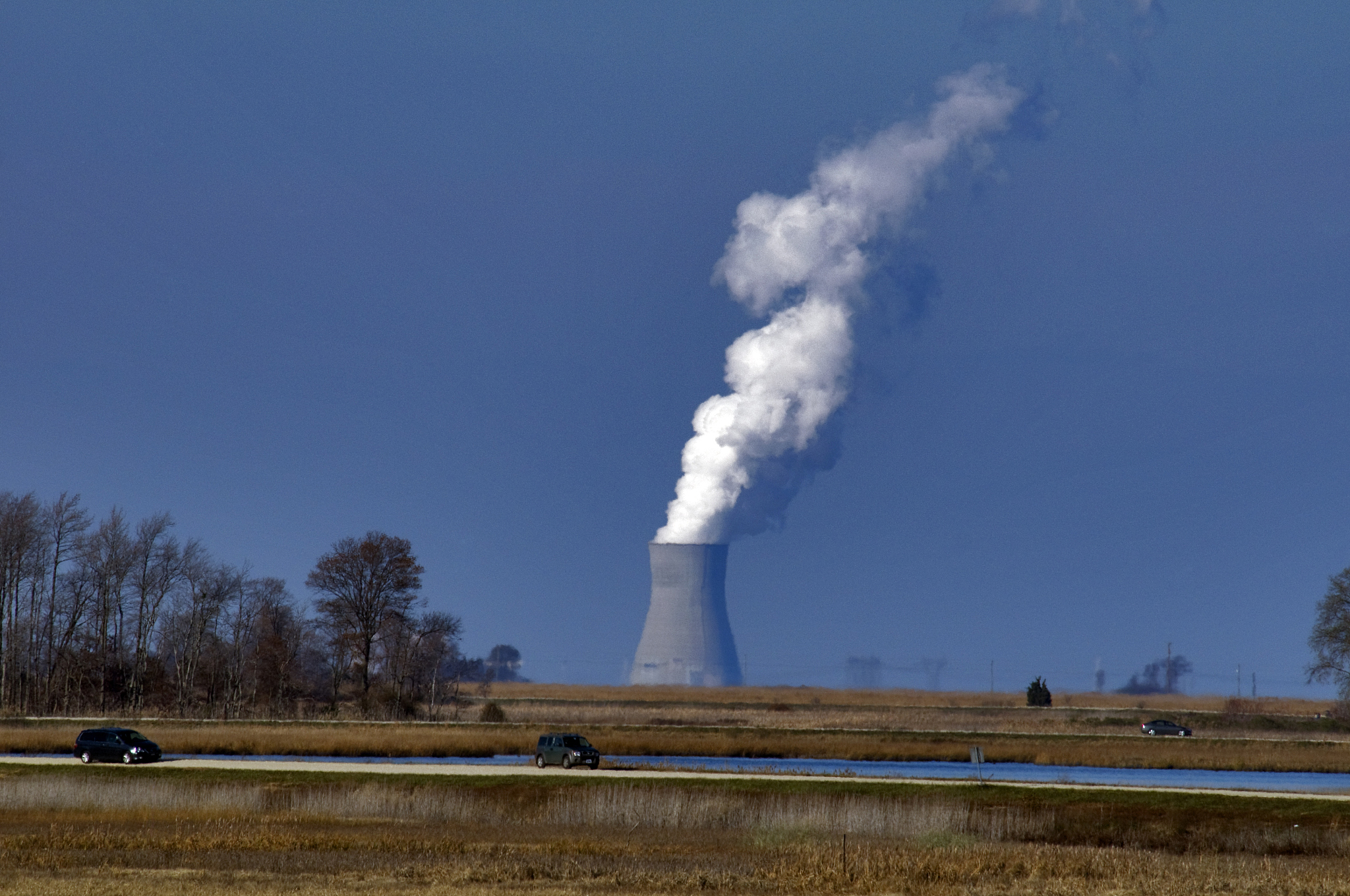 nuclear power facility emitting smoke.