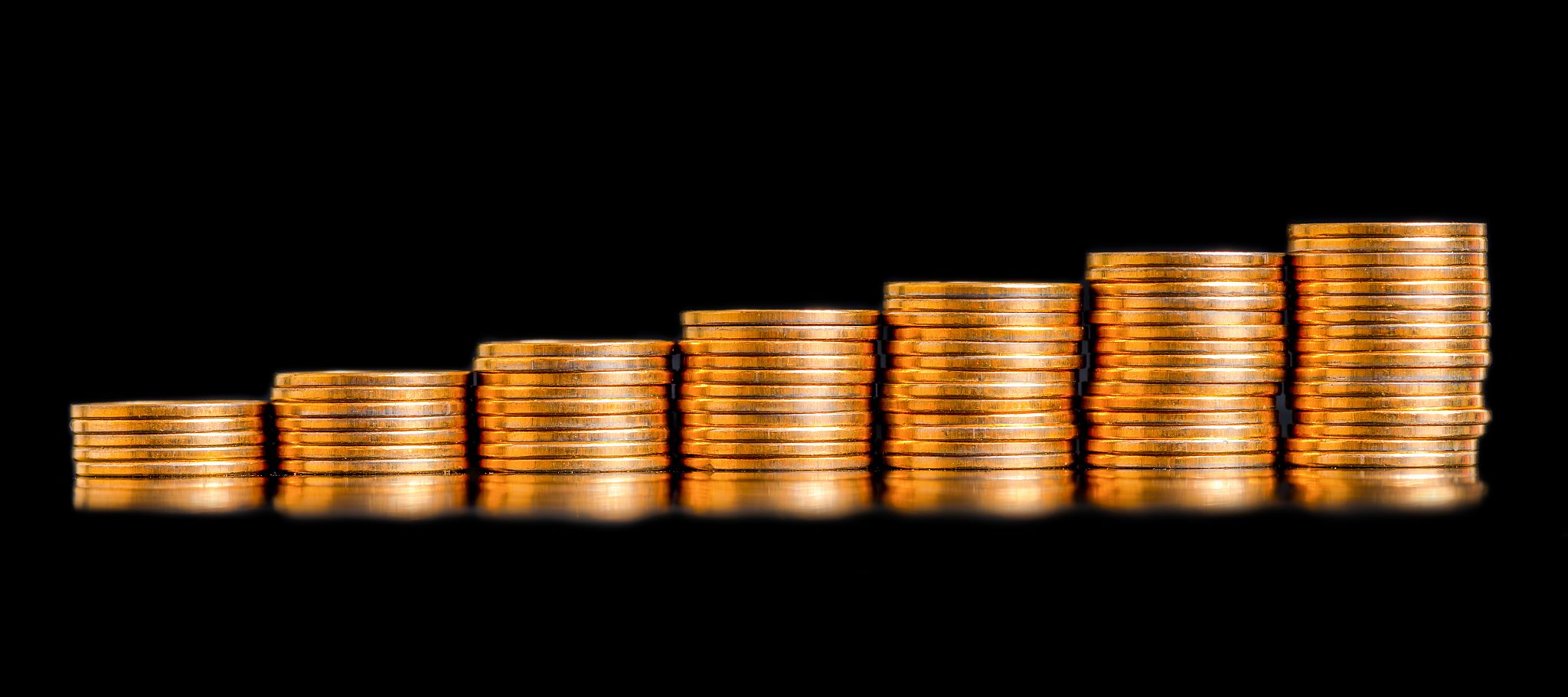 business chart concept of golden coins, shows an slow increase
