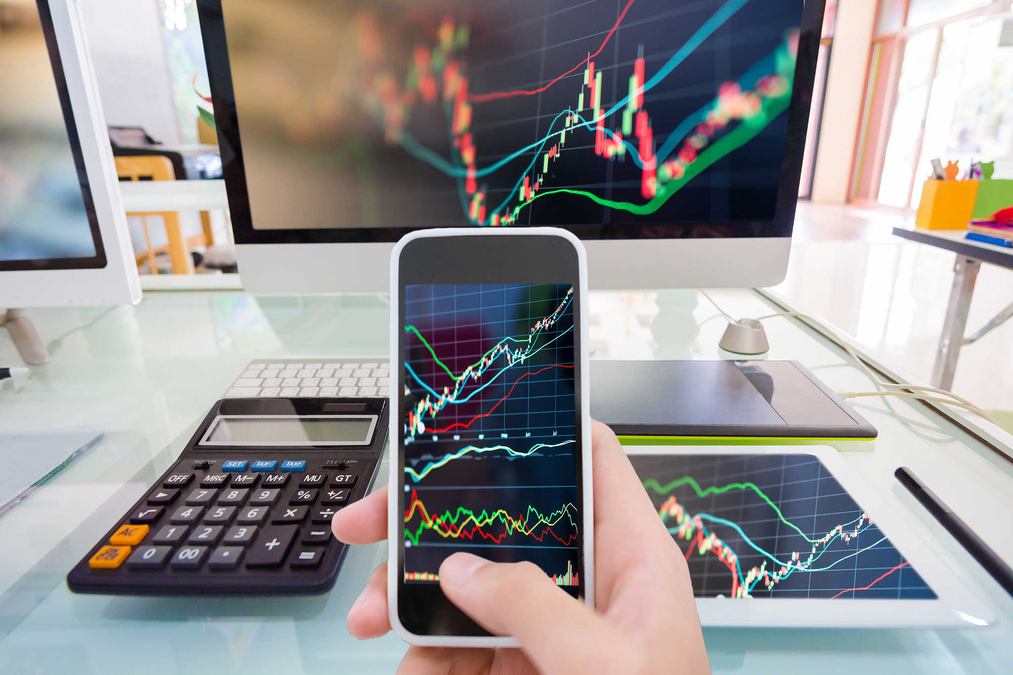 business using a smart phone and digital tablet analysis stock