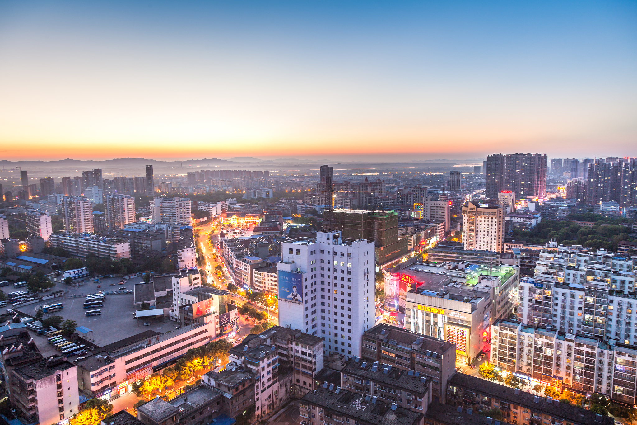 sunset of fuzhou city, old town area bird view under dramatic sk