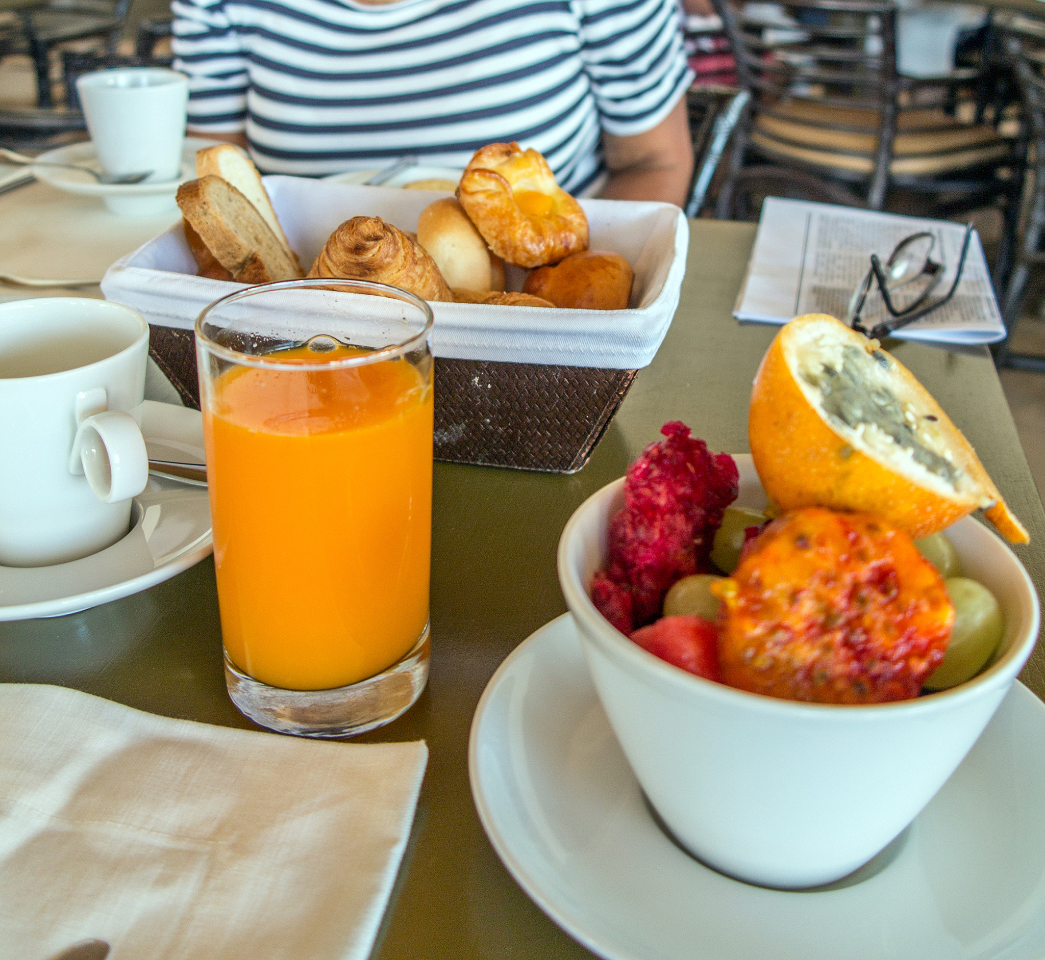 Delicious and Balanced Breakfast: Breakfast Burrito, Orange Juice, and Apple