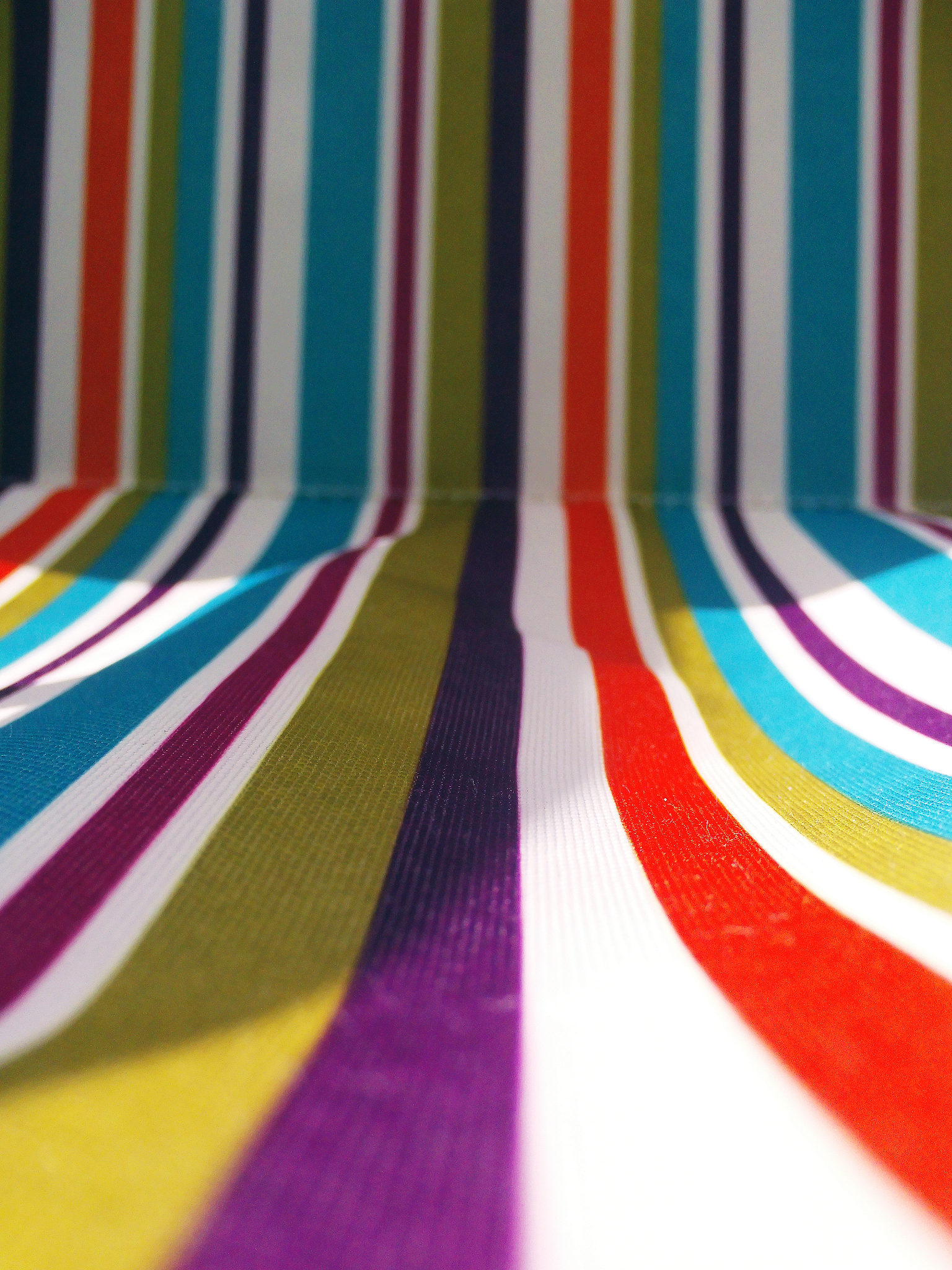 full frame shot of colorful striped deck chair