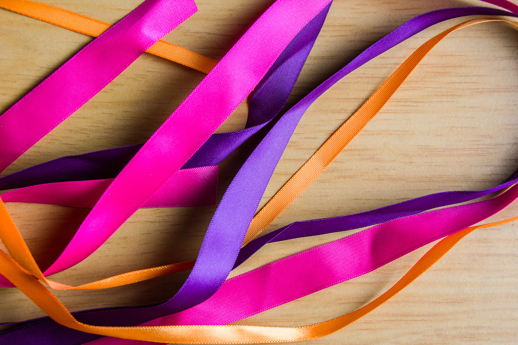 ribbons on wooden background