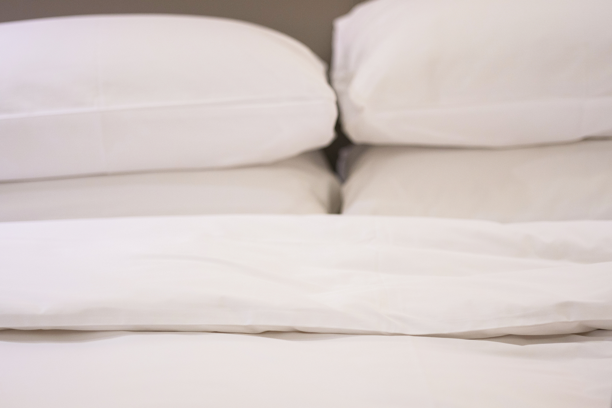 white color pillow and duvet