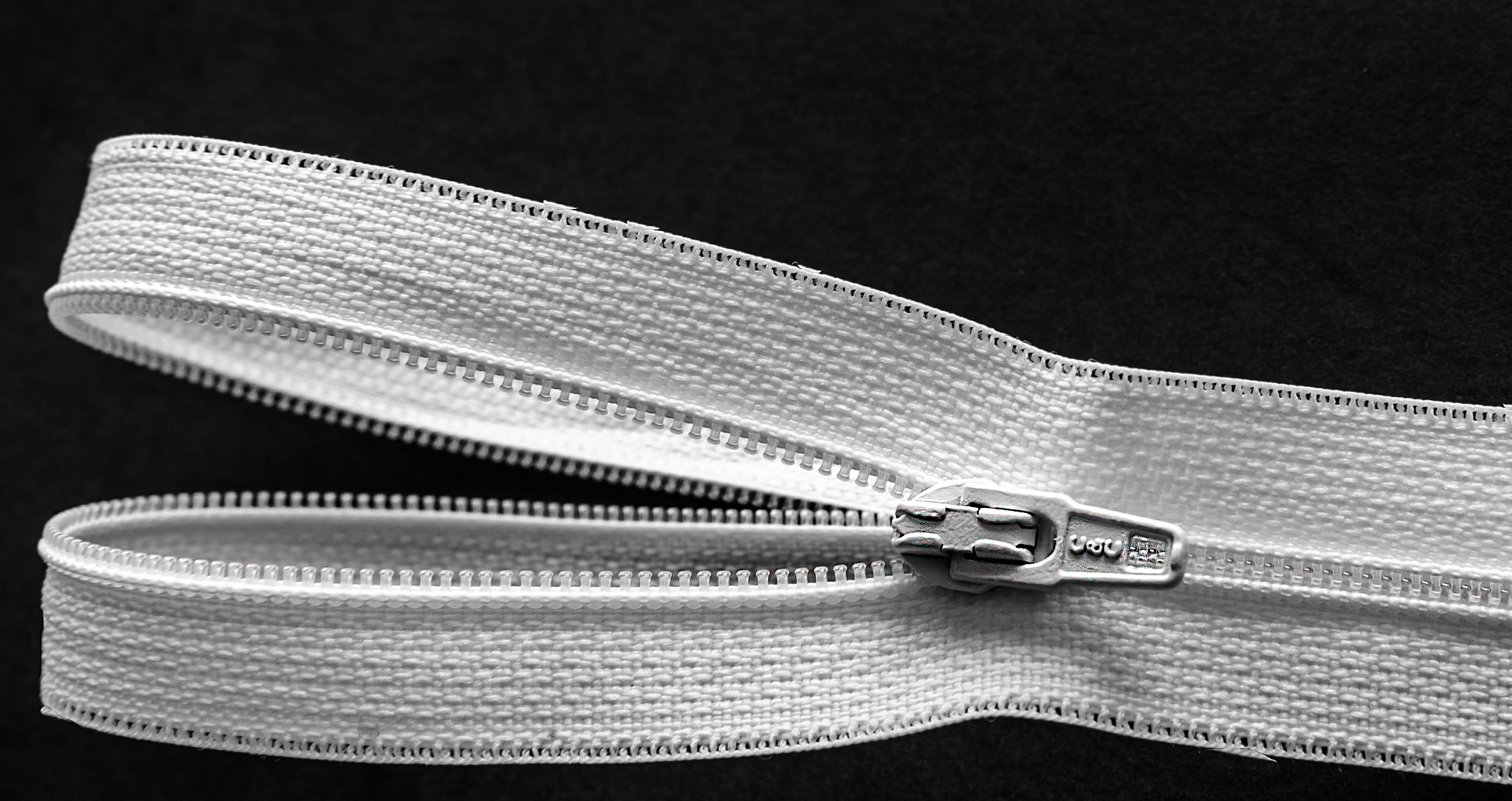 close up of a white zipper
