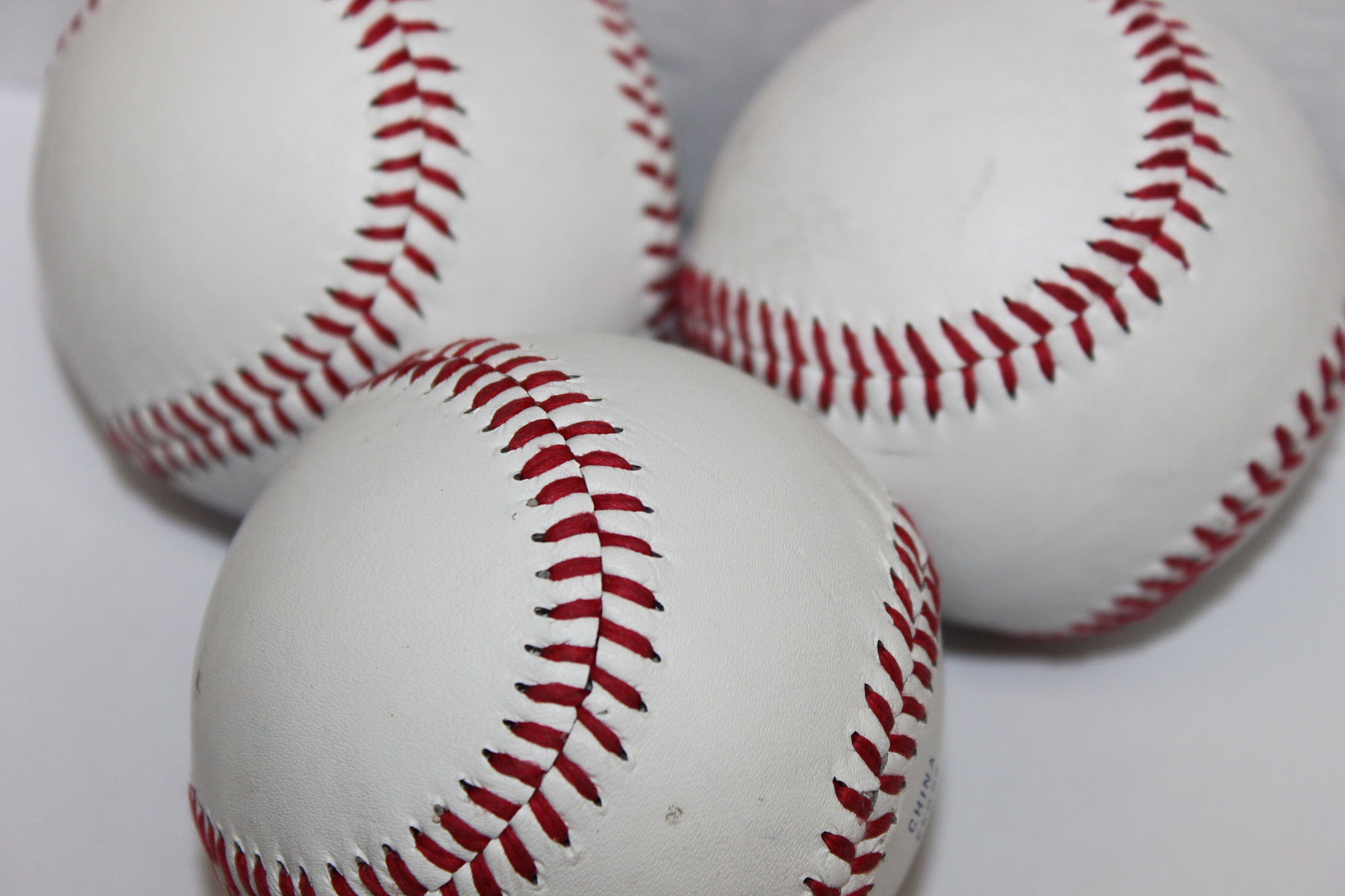 three baseballs