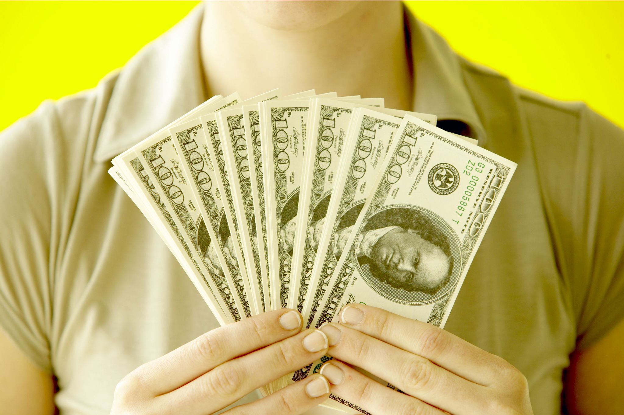 woman holding money