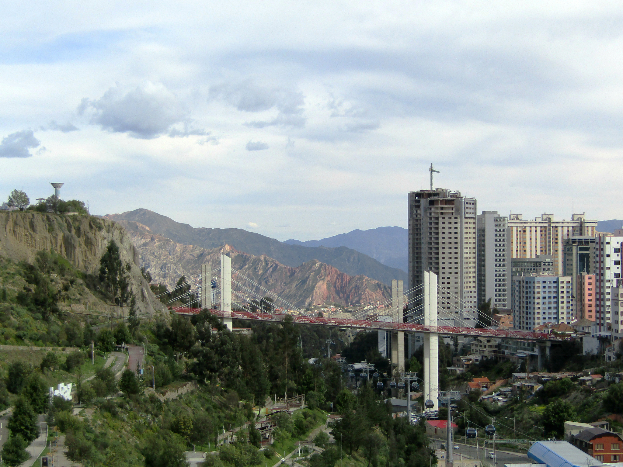 view of buildings in city against cloudy sky