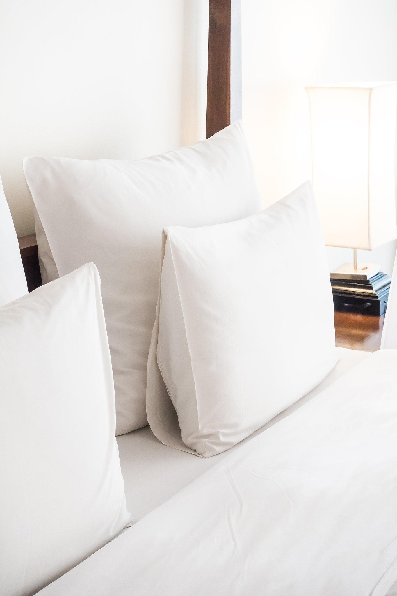 white pillows on a bed