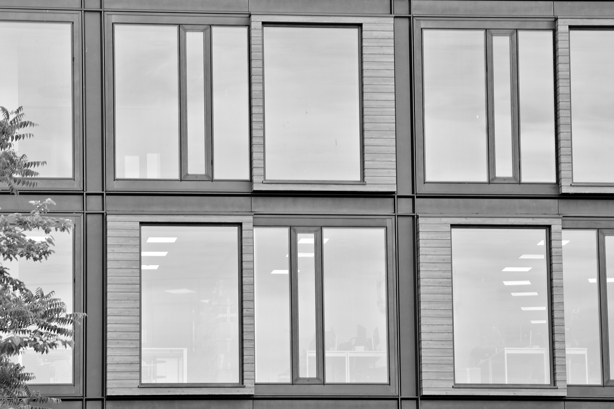 modern office building wall made of steel and glass. black and w