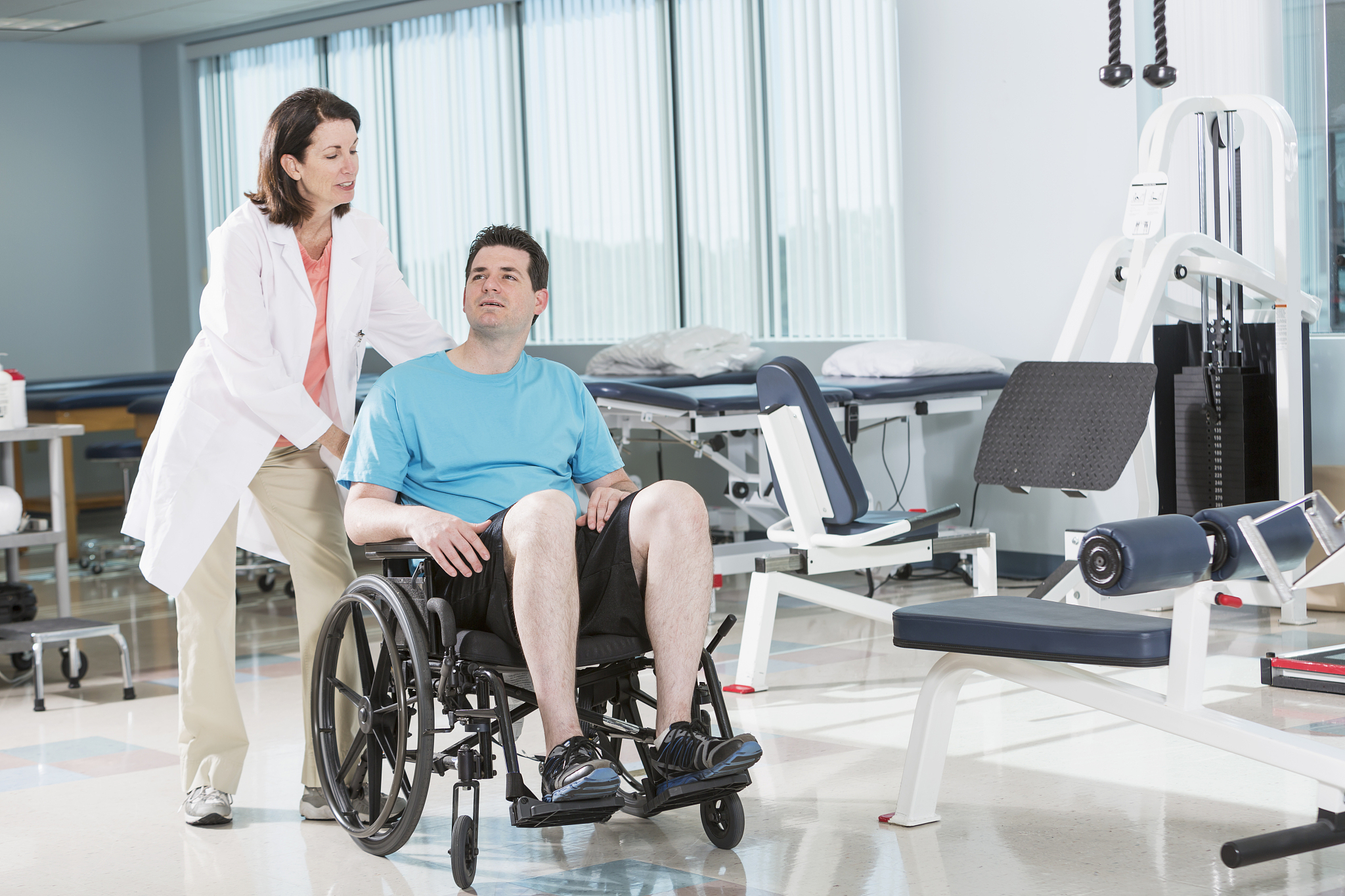 physical therapist with patient