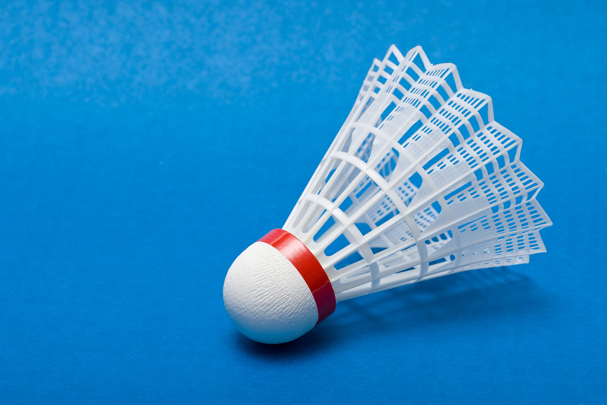 shuttlecock on blue
