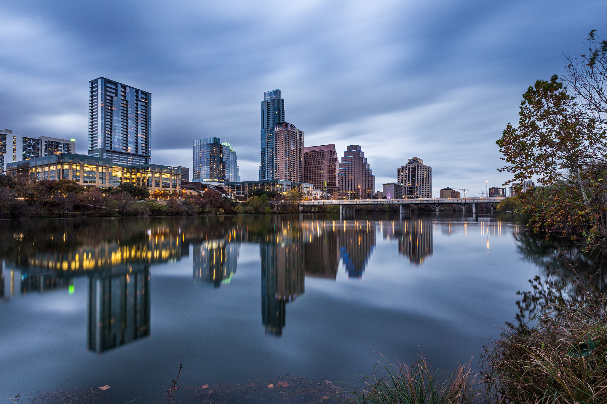 austin downtown skyline by the river at night, texas