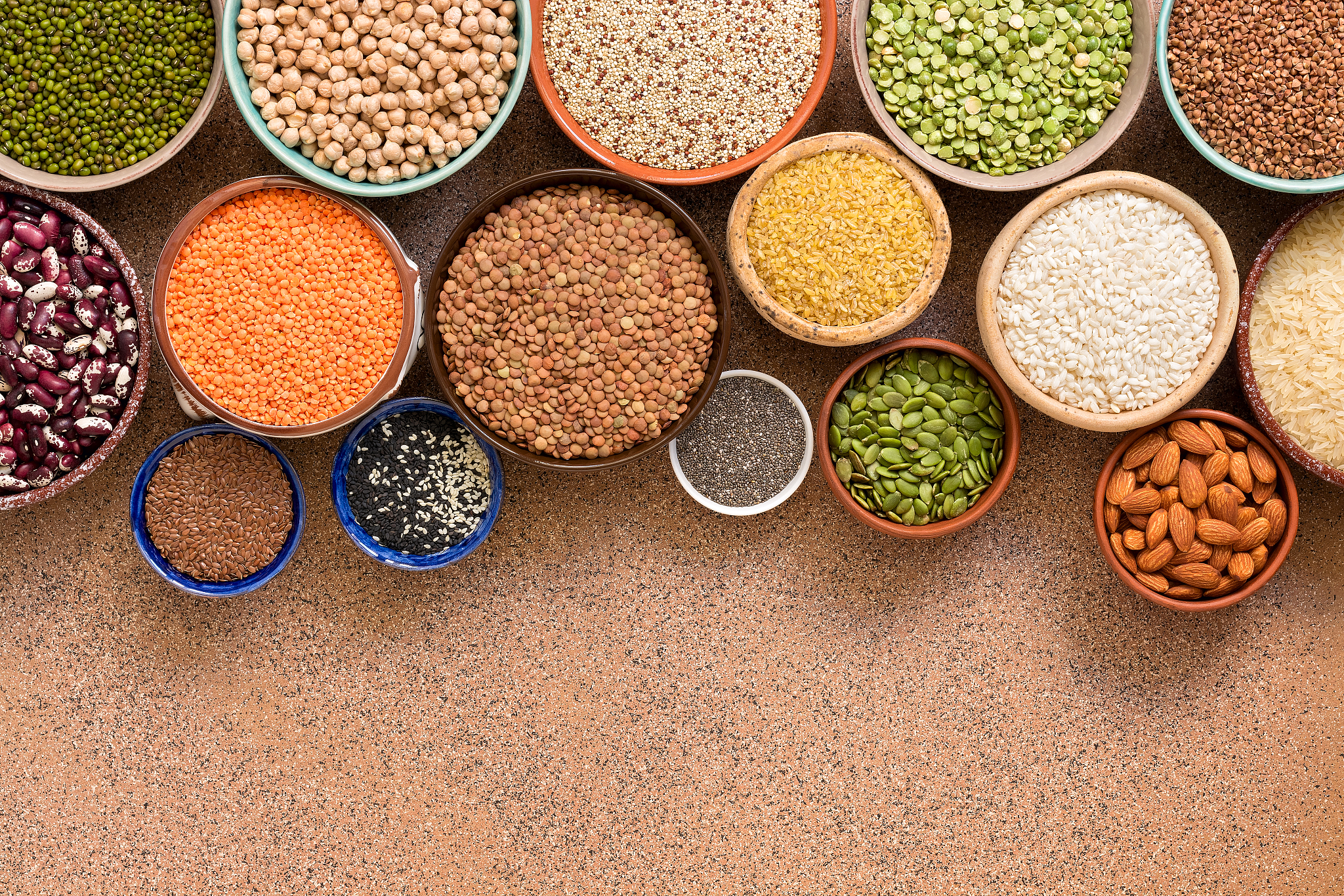 collection of a various of legumes, beans, grains and seeds in b