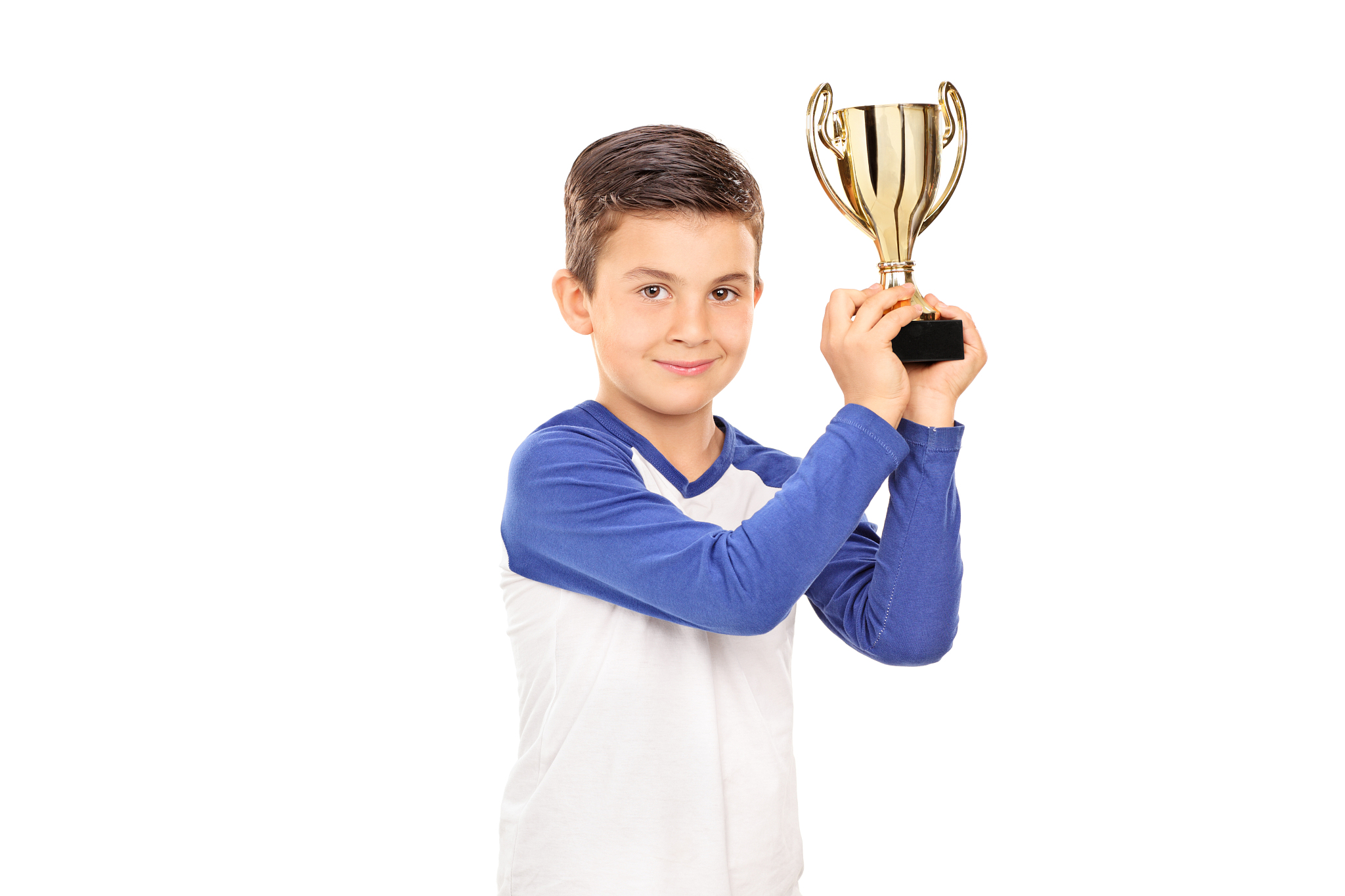 cute child holding a golden trophy