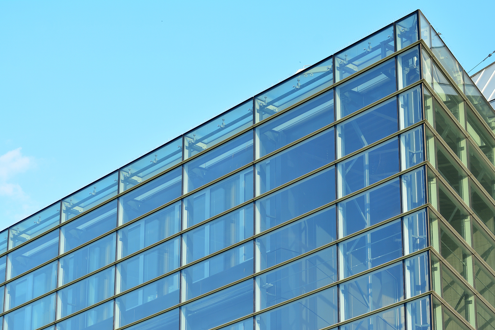 modern office building wall made of steel and glass.