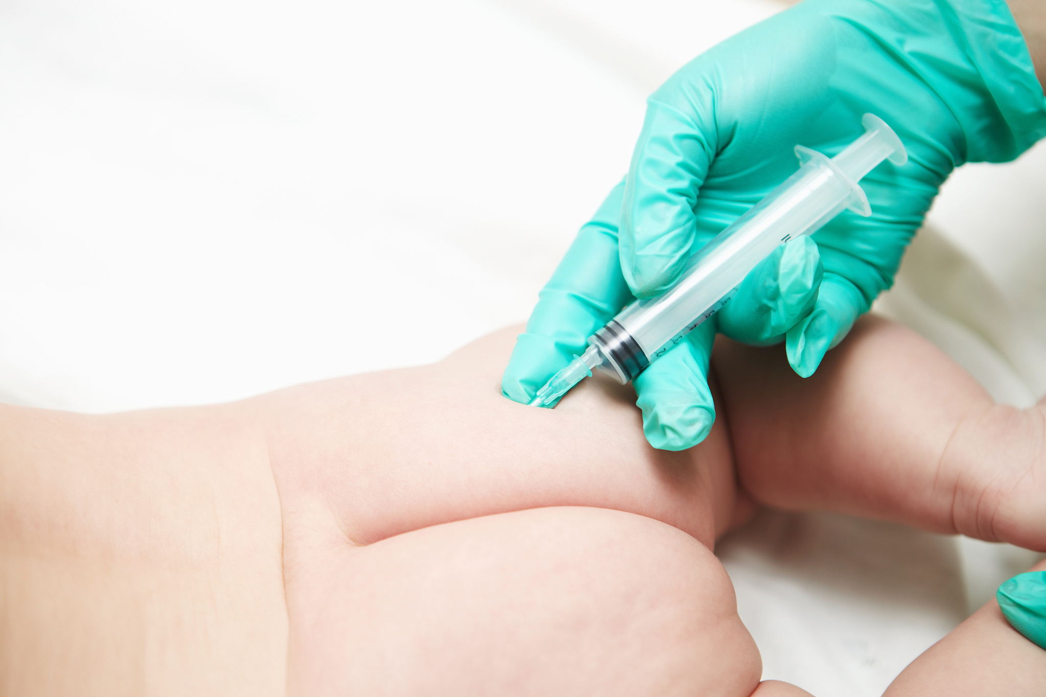 baby healthcare and treatment. medical help. injection.