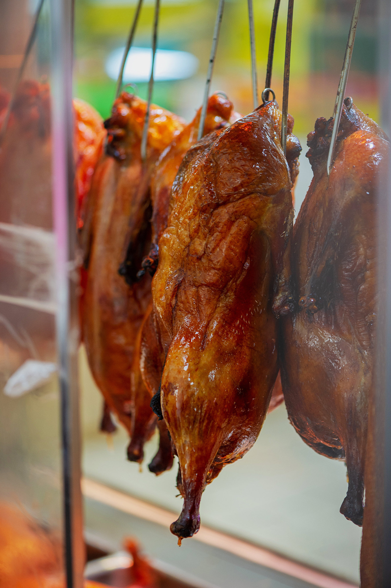 peking bbq roast duck hangs in the showcase