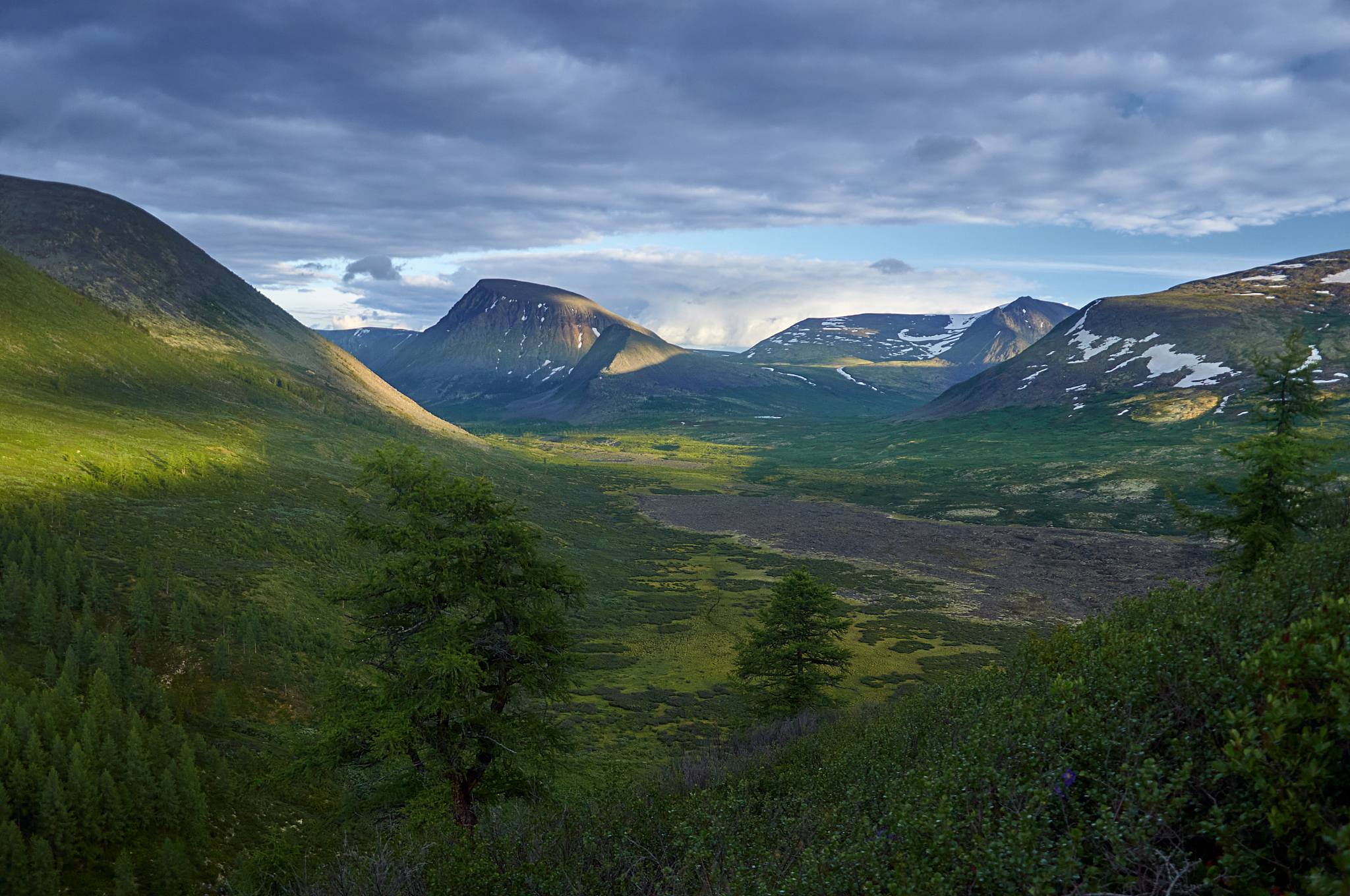 wilderness. valley and mountain on the horizon. volcanic terrain