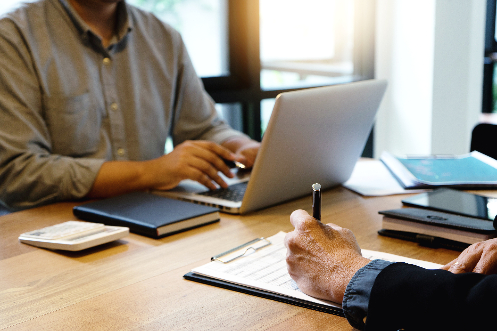 businessman and businesswoman working to analyses market stock