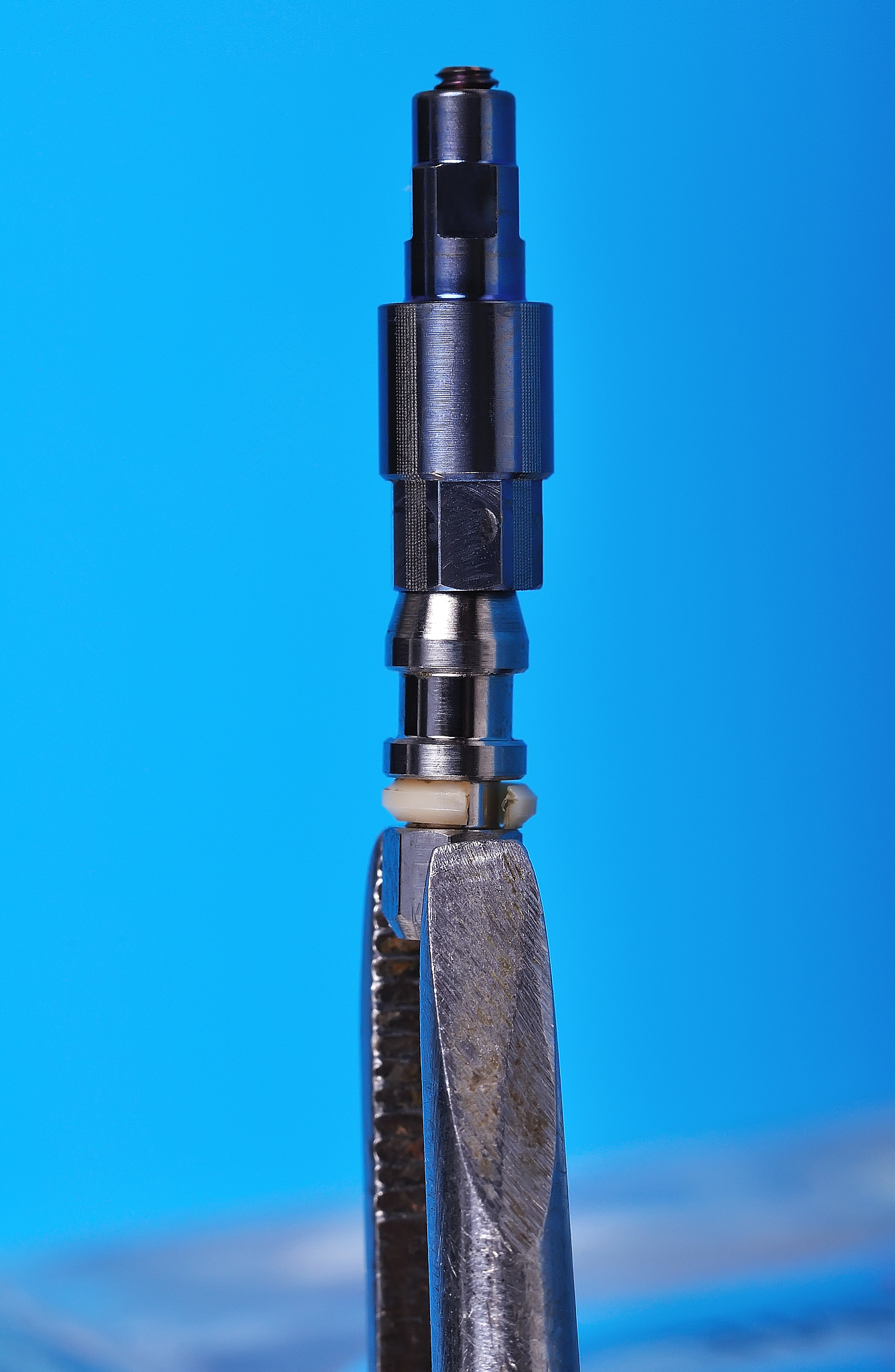 implant in tweezers