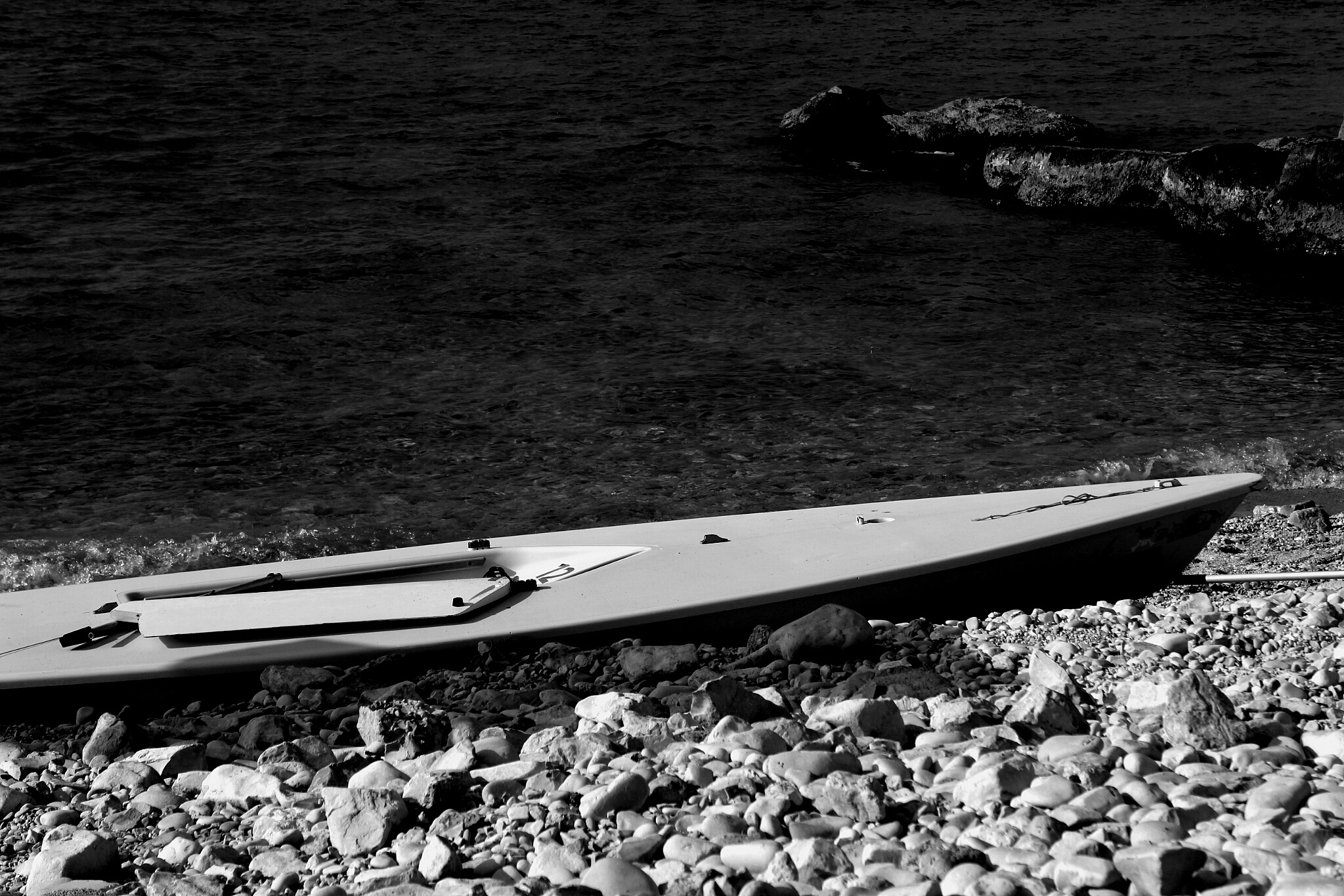 kayak moored on shore