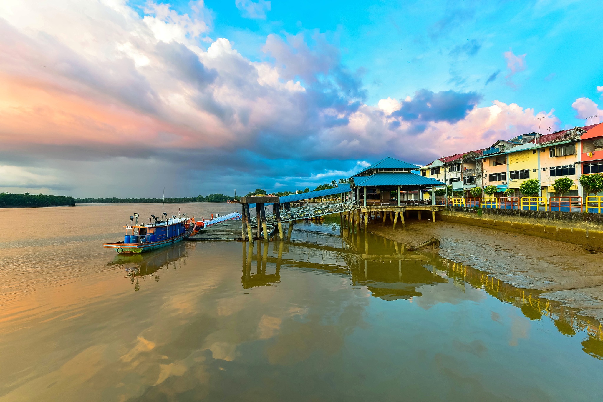 daytime clouds and reflections in sarikei, sarawak