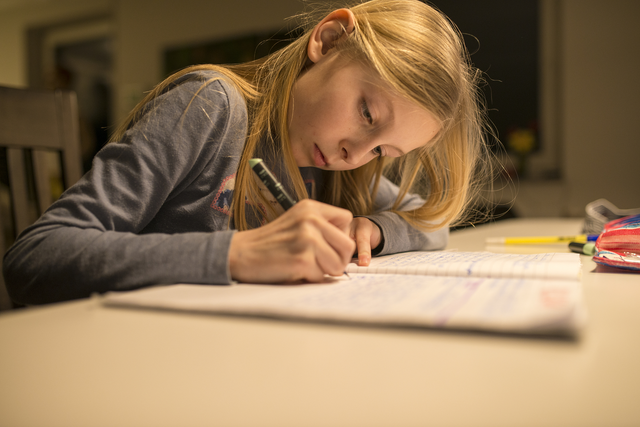young girl doing homework