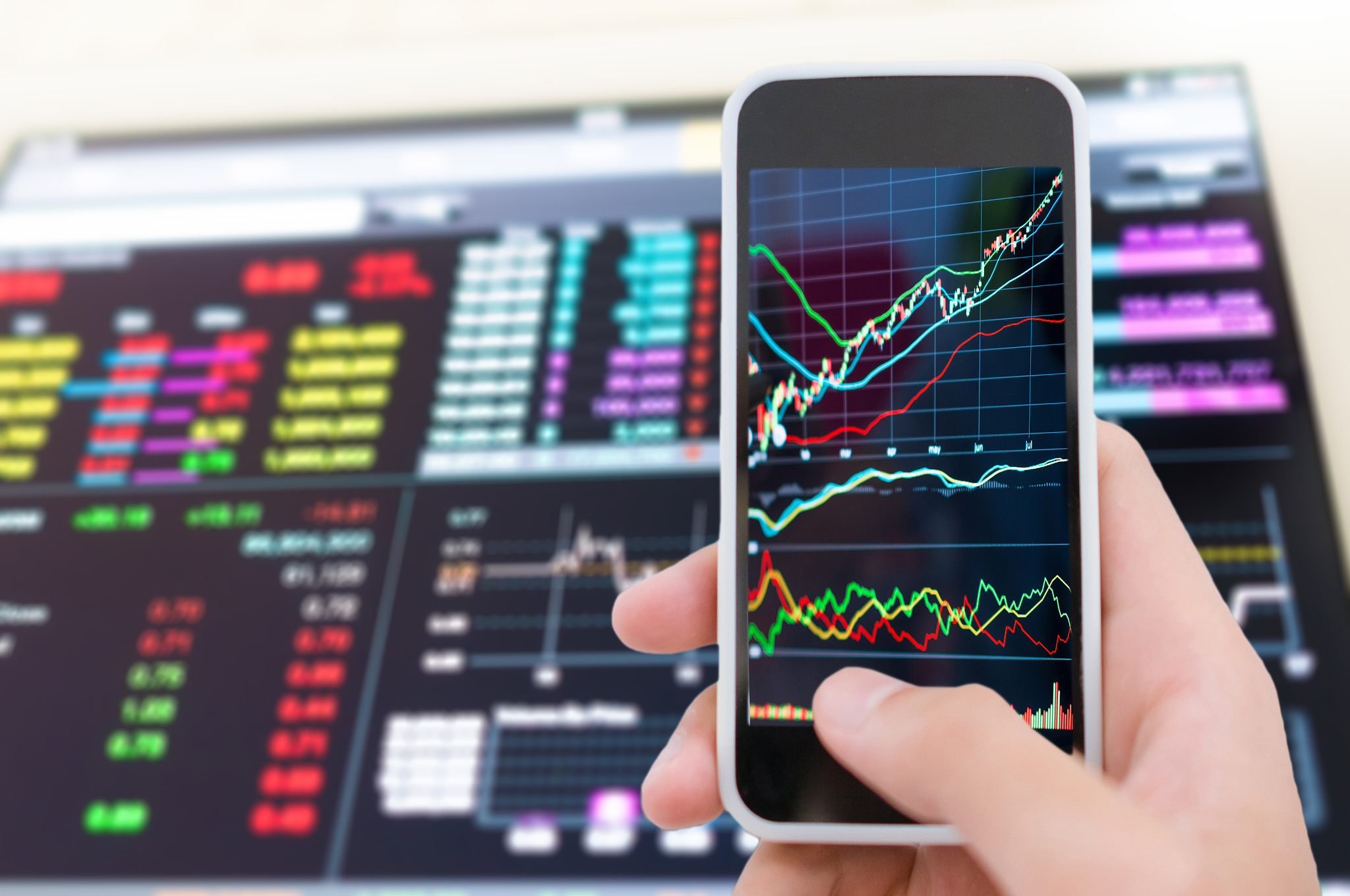 asian businessman using a smart phone analysis stock
