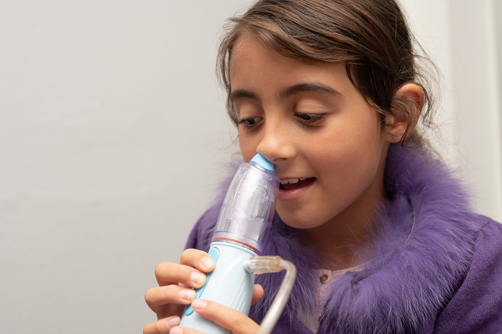 living with allergies. cold and flu. making aerosol. little girl