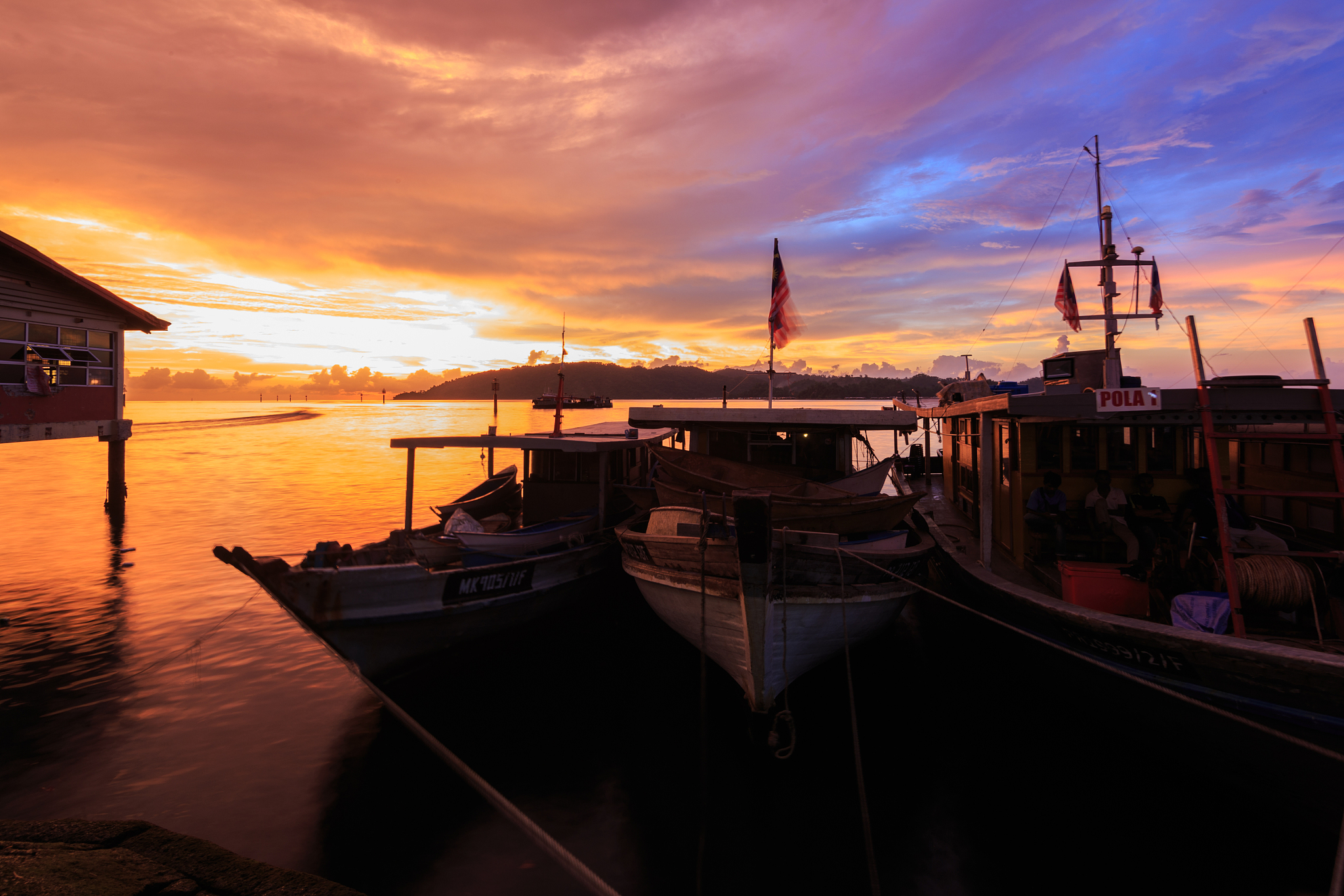 beautiful landscape sunset scene with fisherman boat
