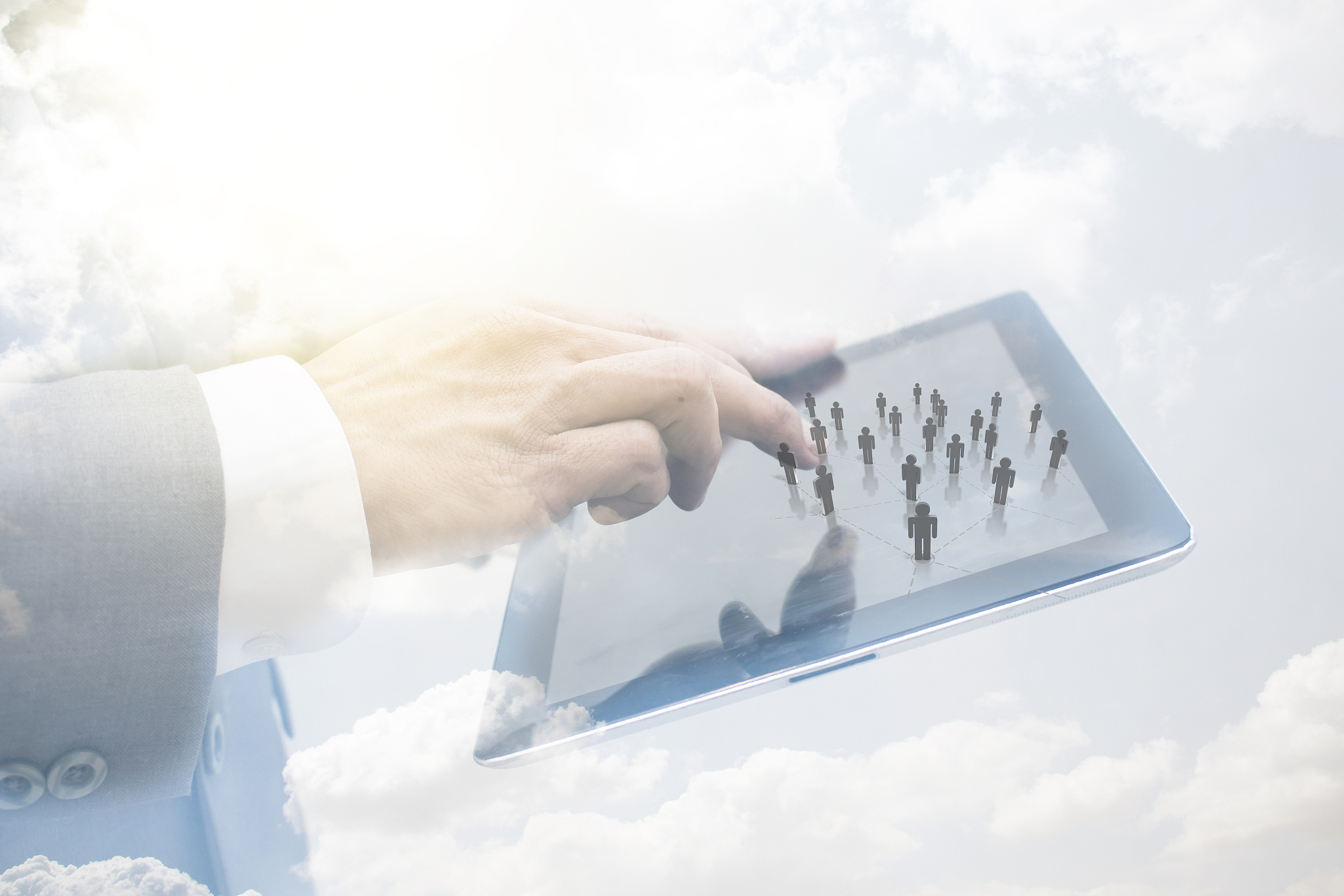 digital composite image of businessman using digital tablet agai