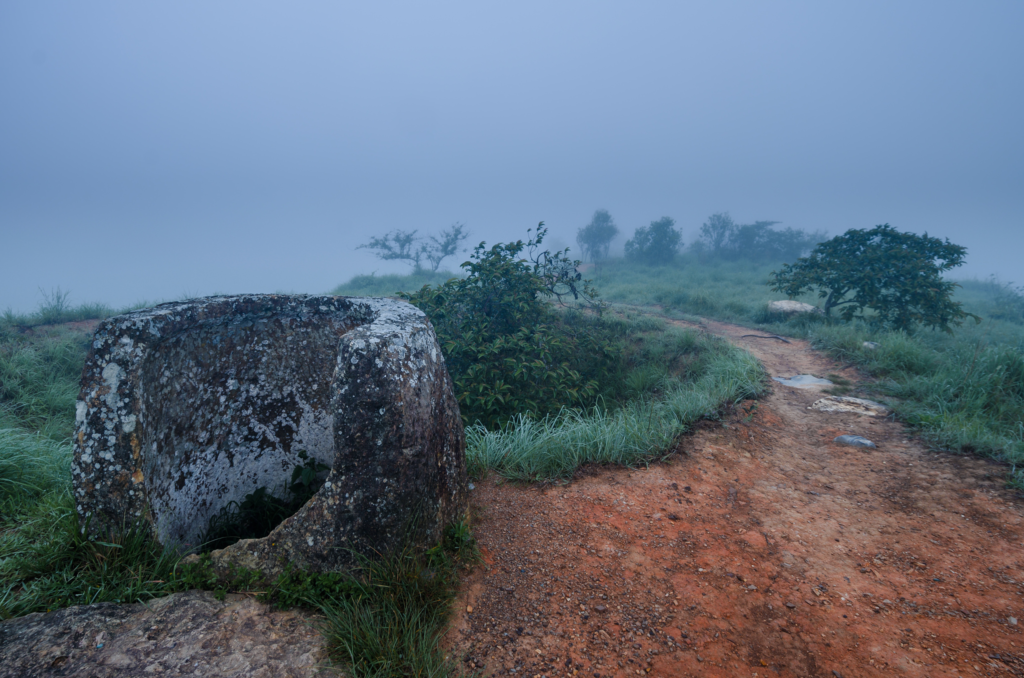 a field of jars in phonsavann, laos