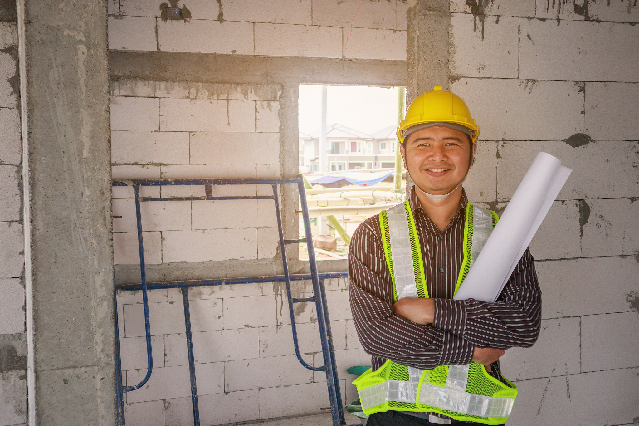 asian business man construction engineer worker at house buildin