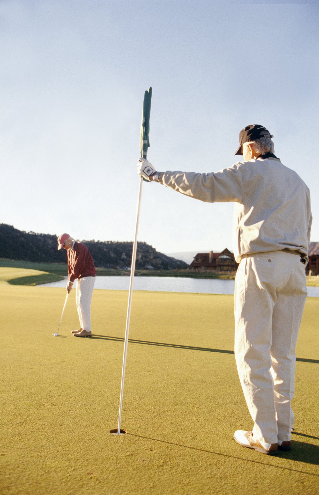 couple playing golf
