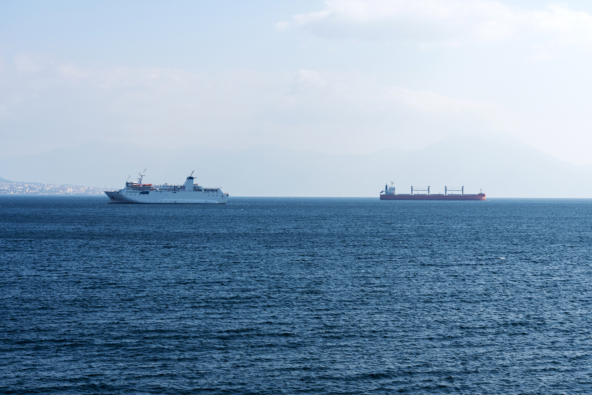 tanker and liner on the horizon of the sea.