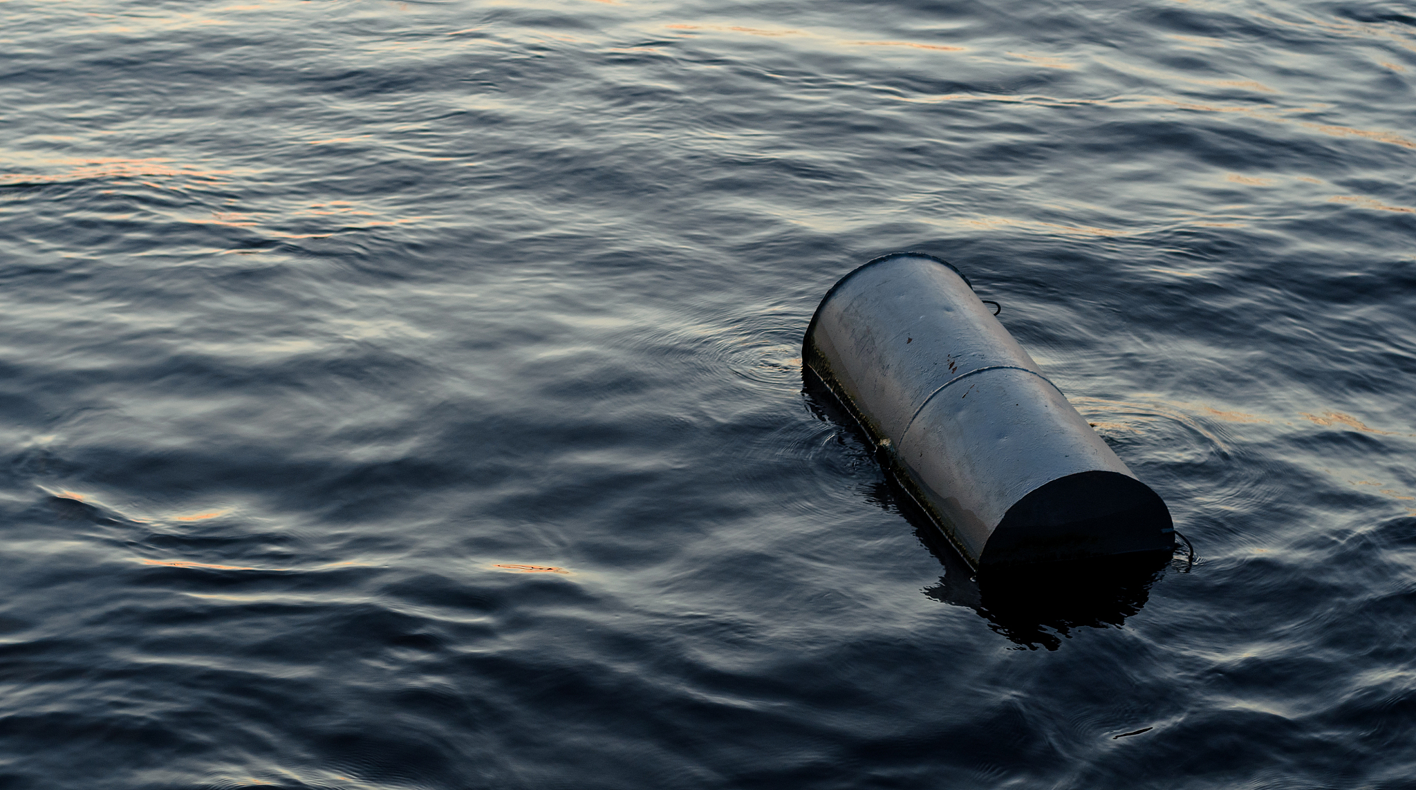 garbage or oil polluting the natural environment, pollution of t