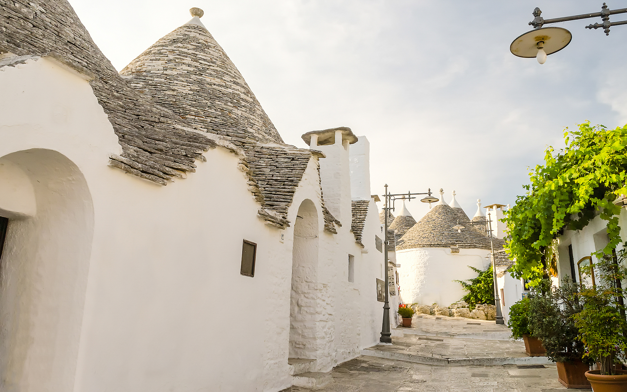 typical trulli buildings in alberobello, apulia, italy