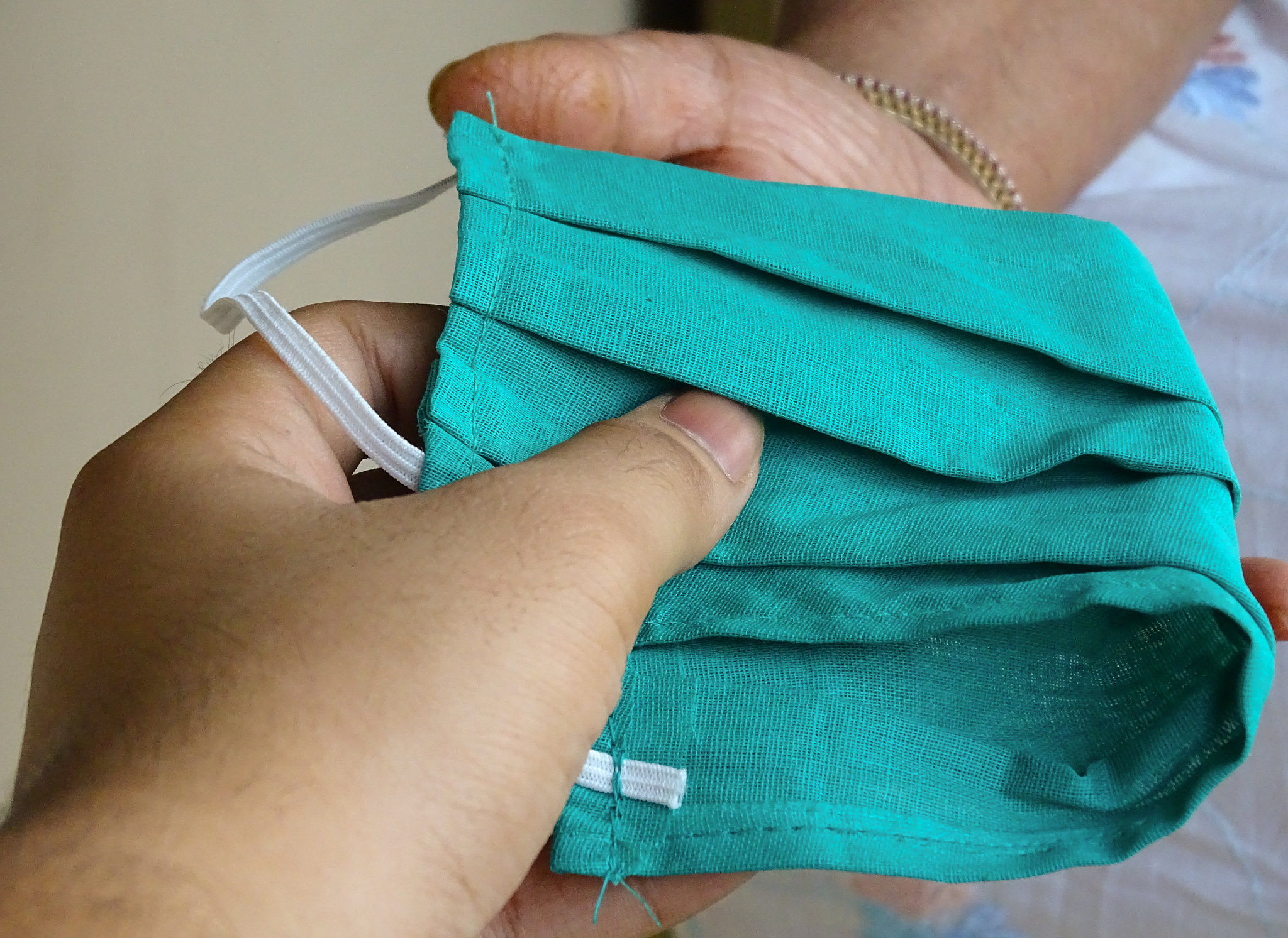 giving safety mask during covid 19 pandemic for safety and preca