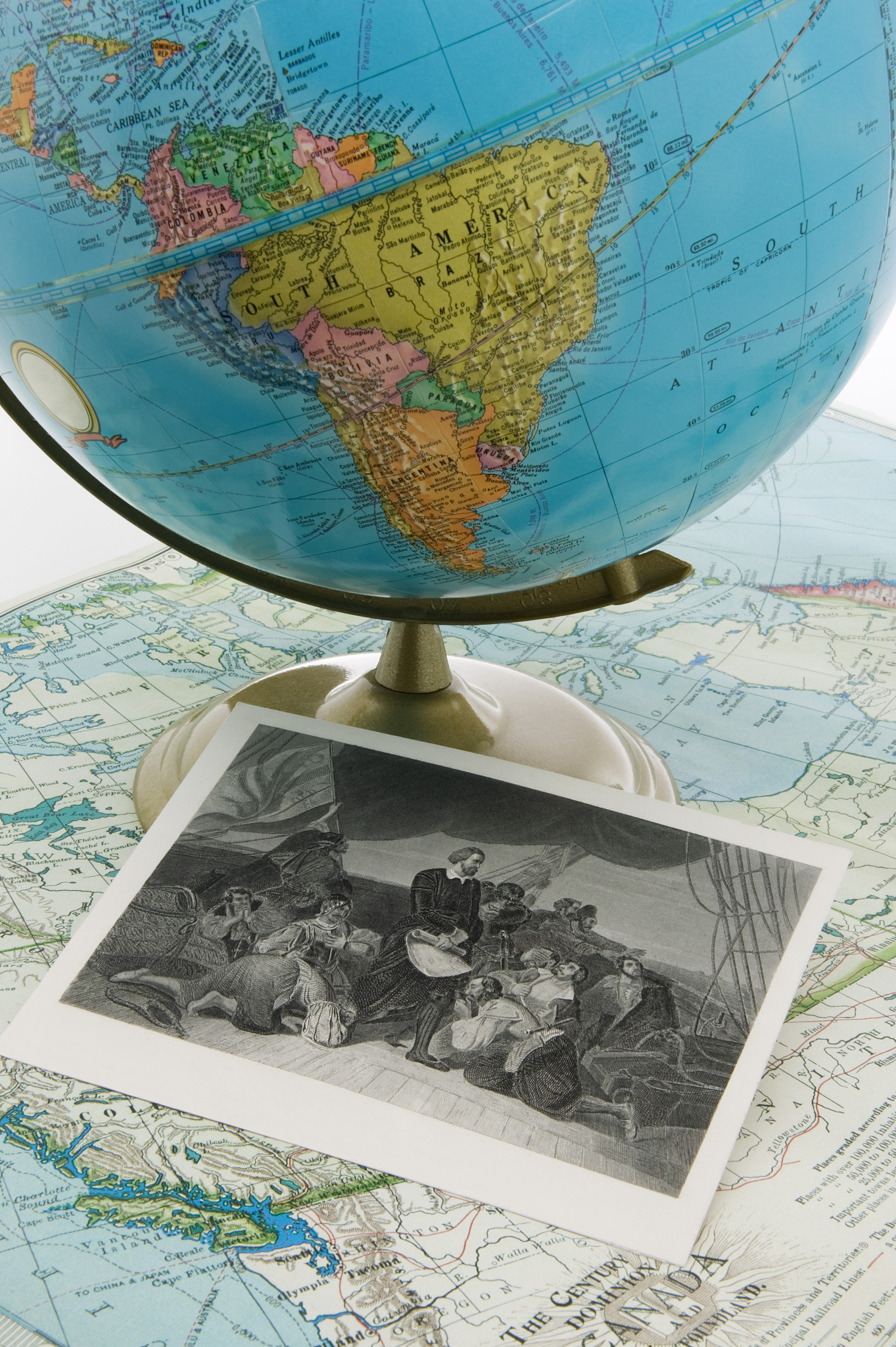 globe, map and photograph