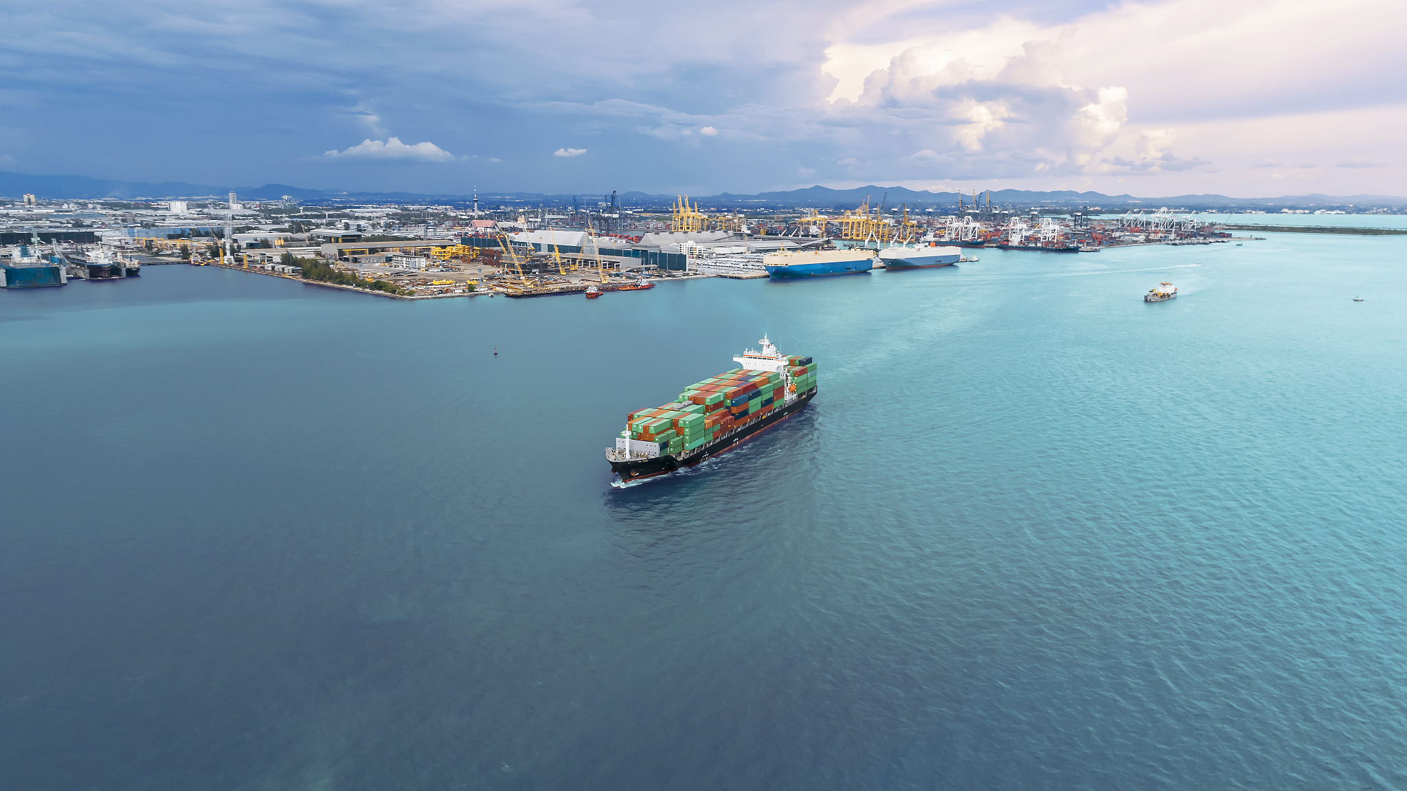 aerial top view container ship runing have wave in green sea, ba