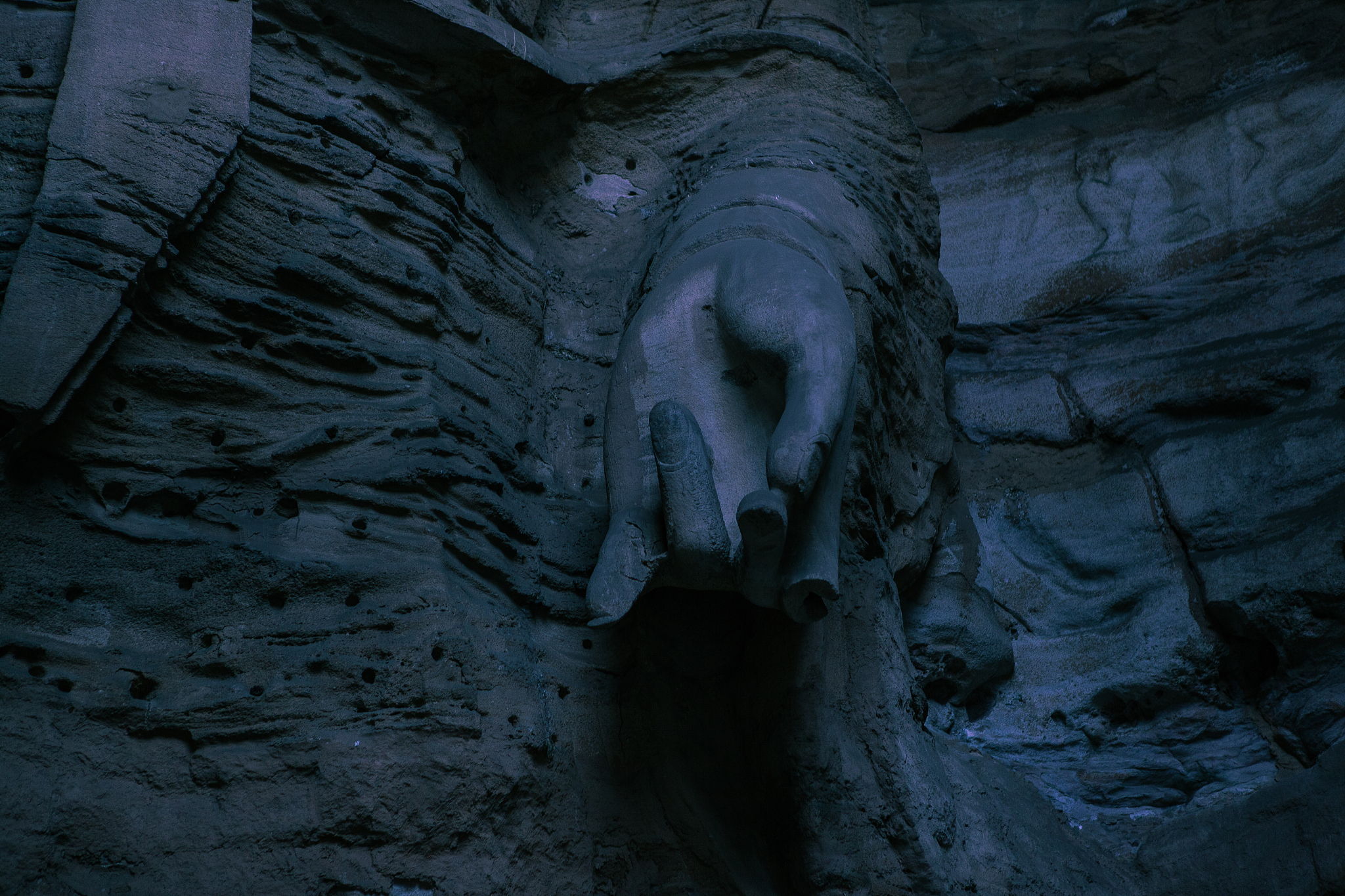 broken buddha sculpture