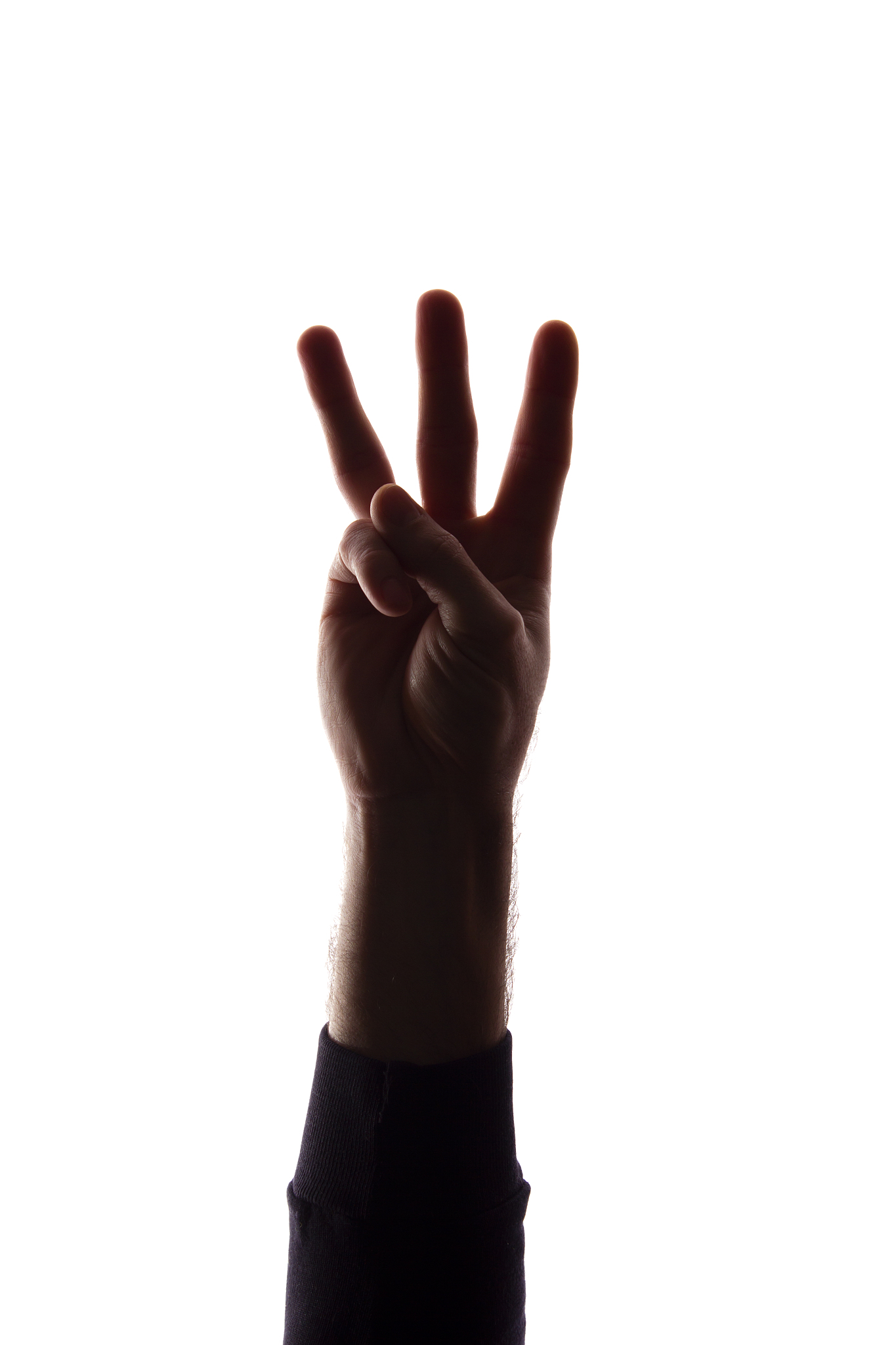 the hand young man with fingers apart, number three - silhouette