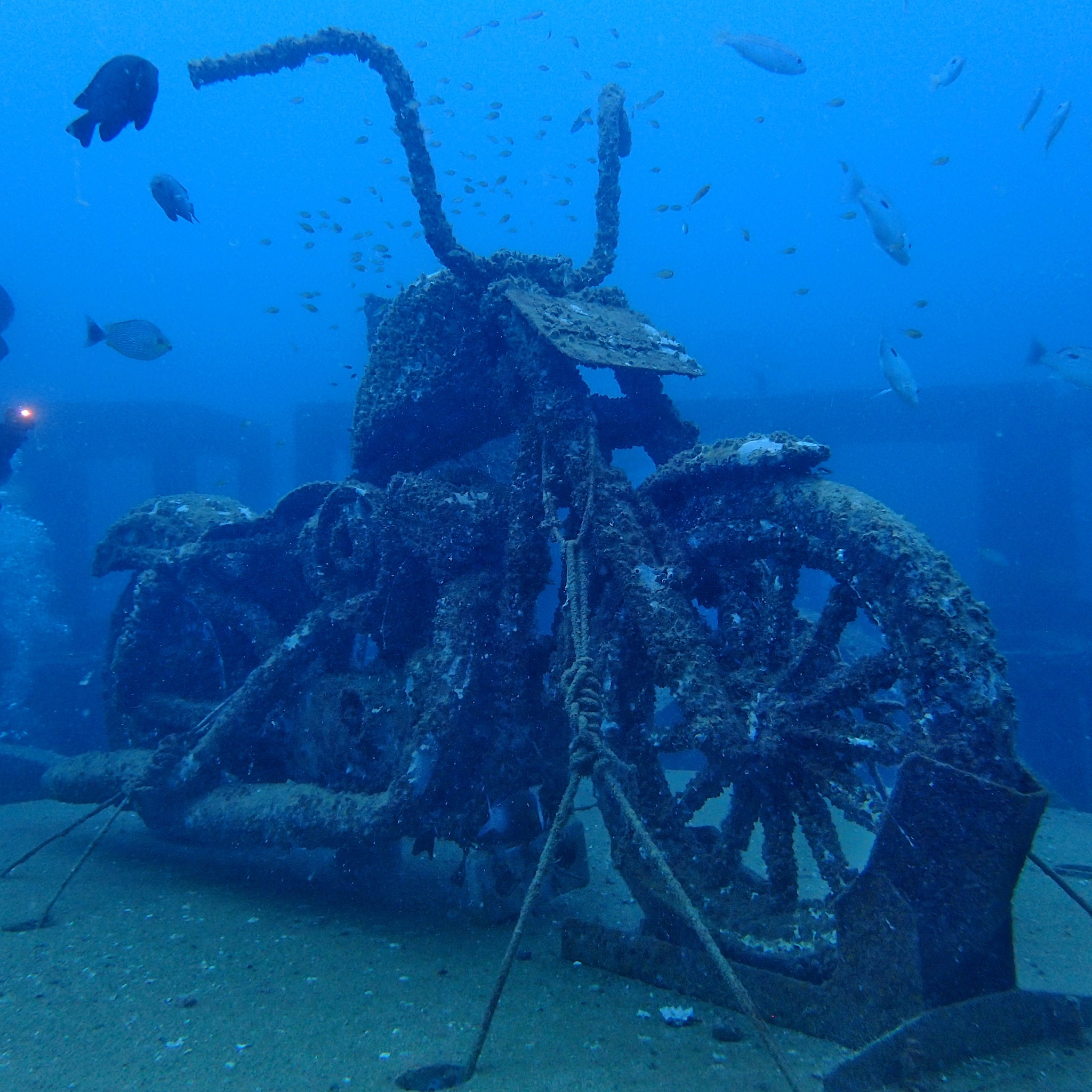 the motorcycle the bottom of the blue deep ocean