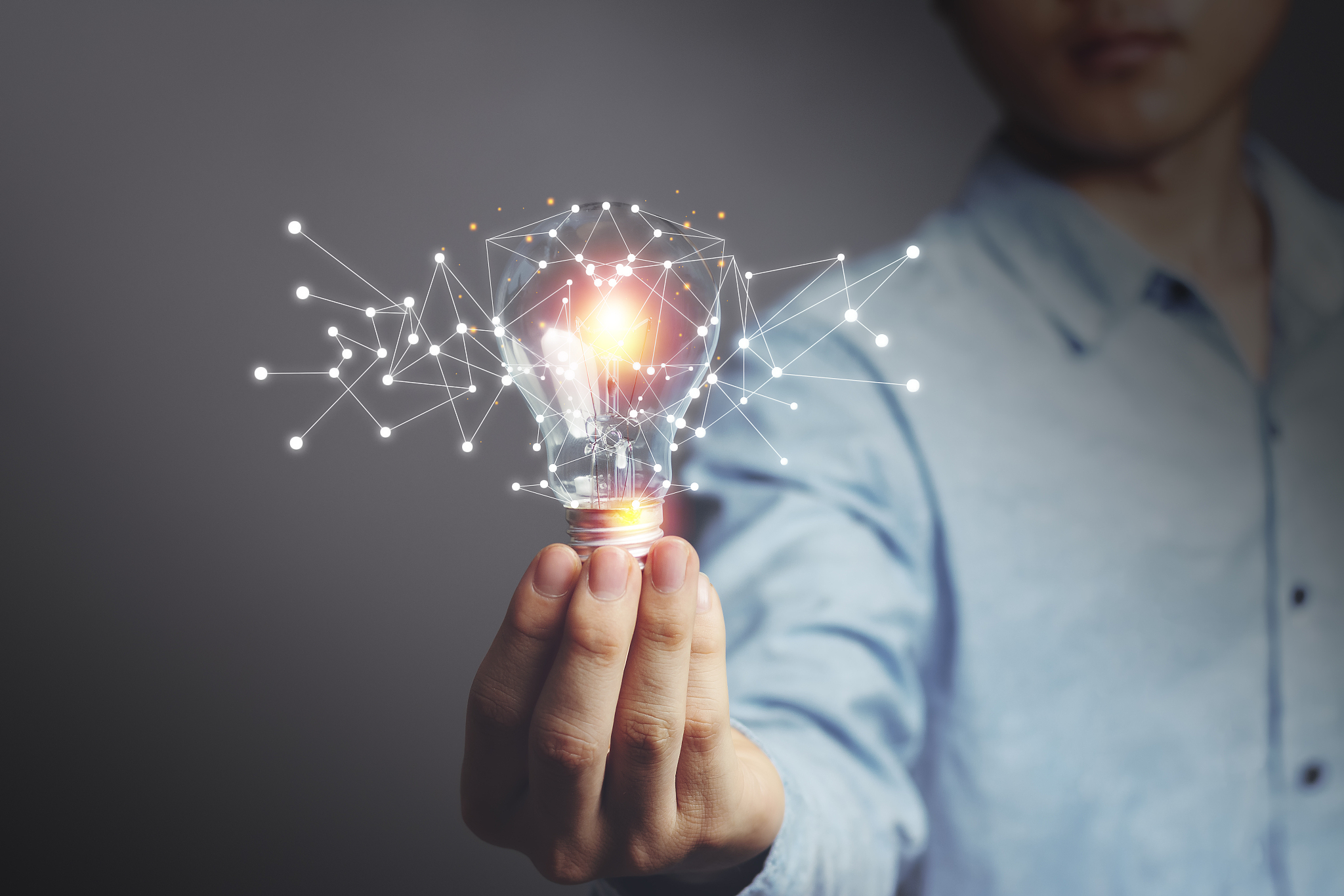 asian men holding light bulbs, ideas of new ideas with innovativ