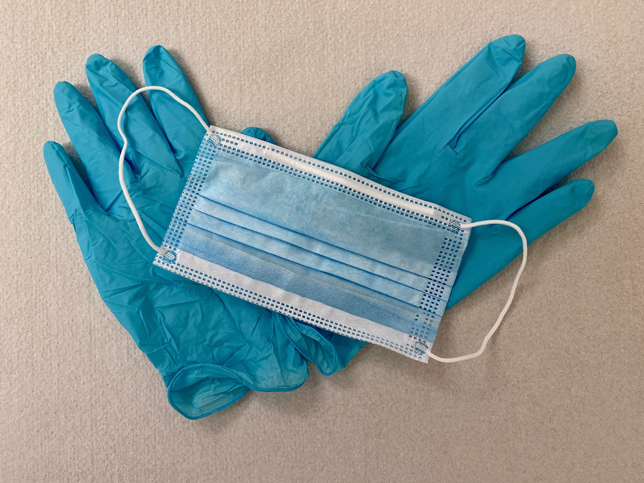 blue medical protective gloves, blue surgical face mask