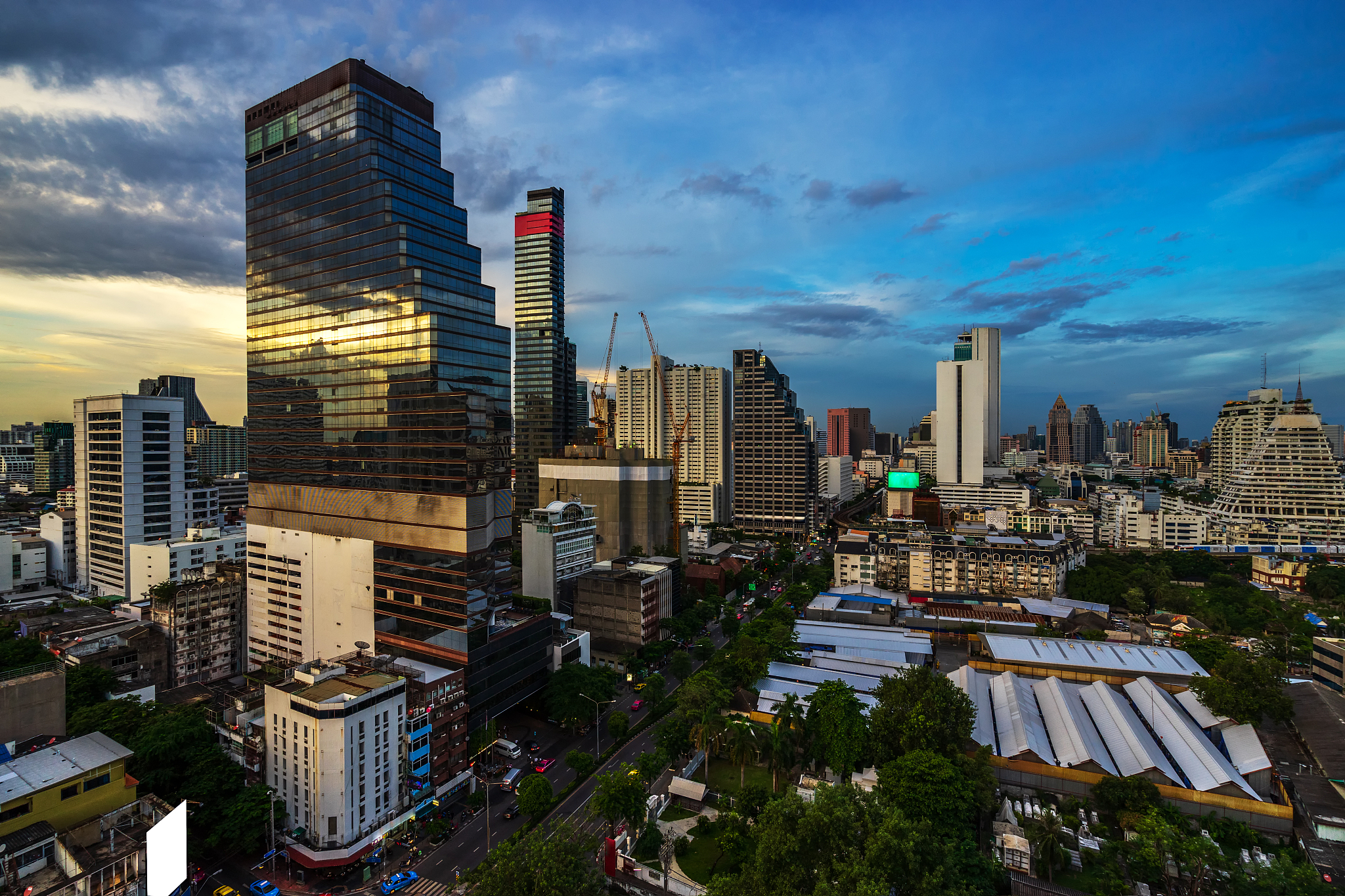 scenic of cityscape of metropolis building in evening sky