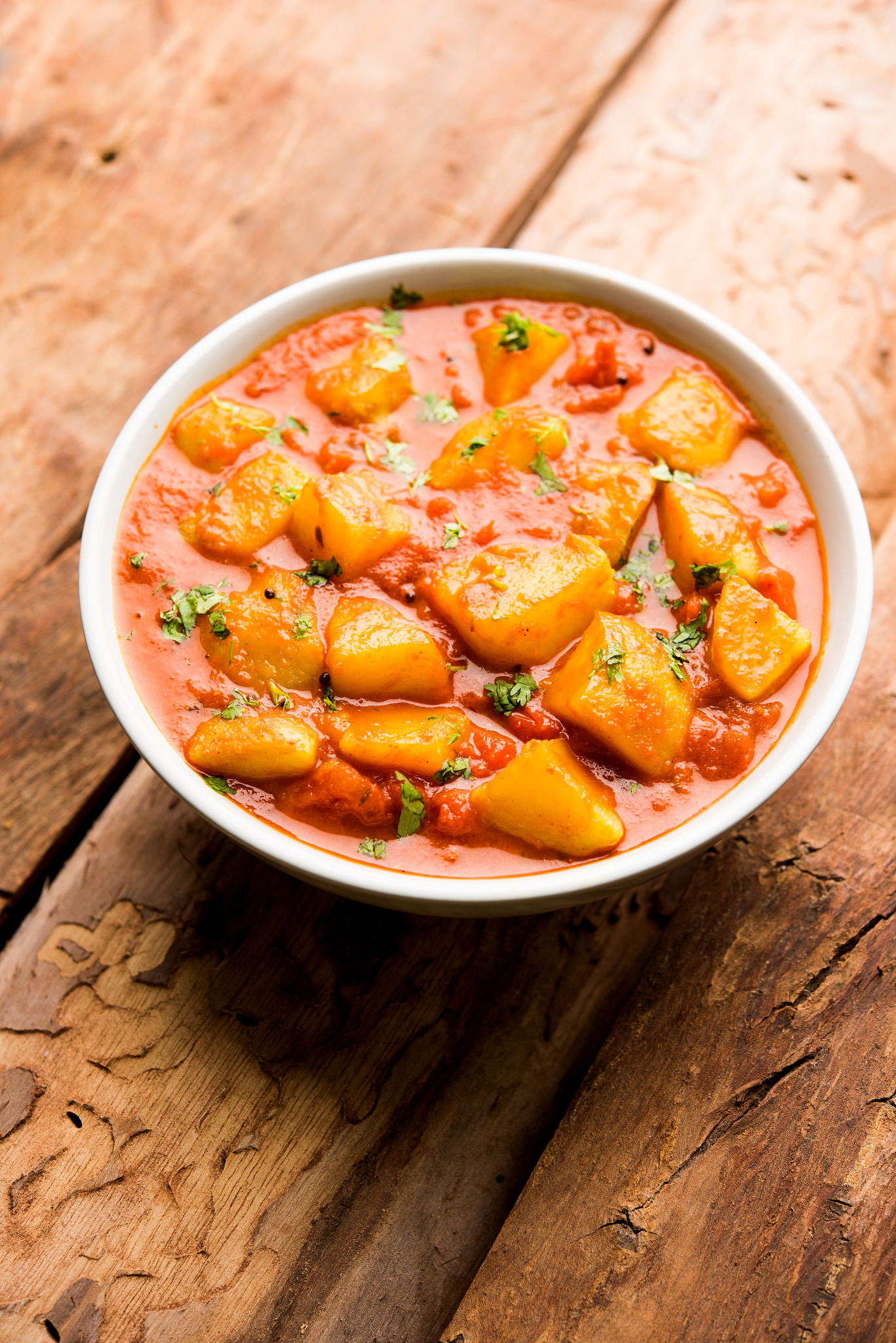 indian food - aloo curry masala. potato cooked with spices and h
