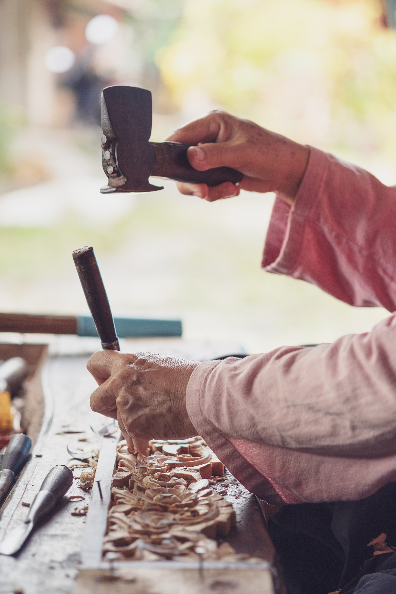 midsection of person working on wood