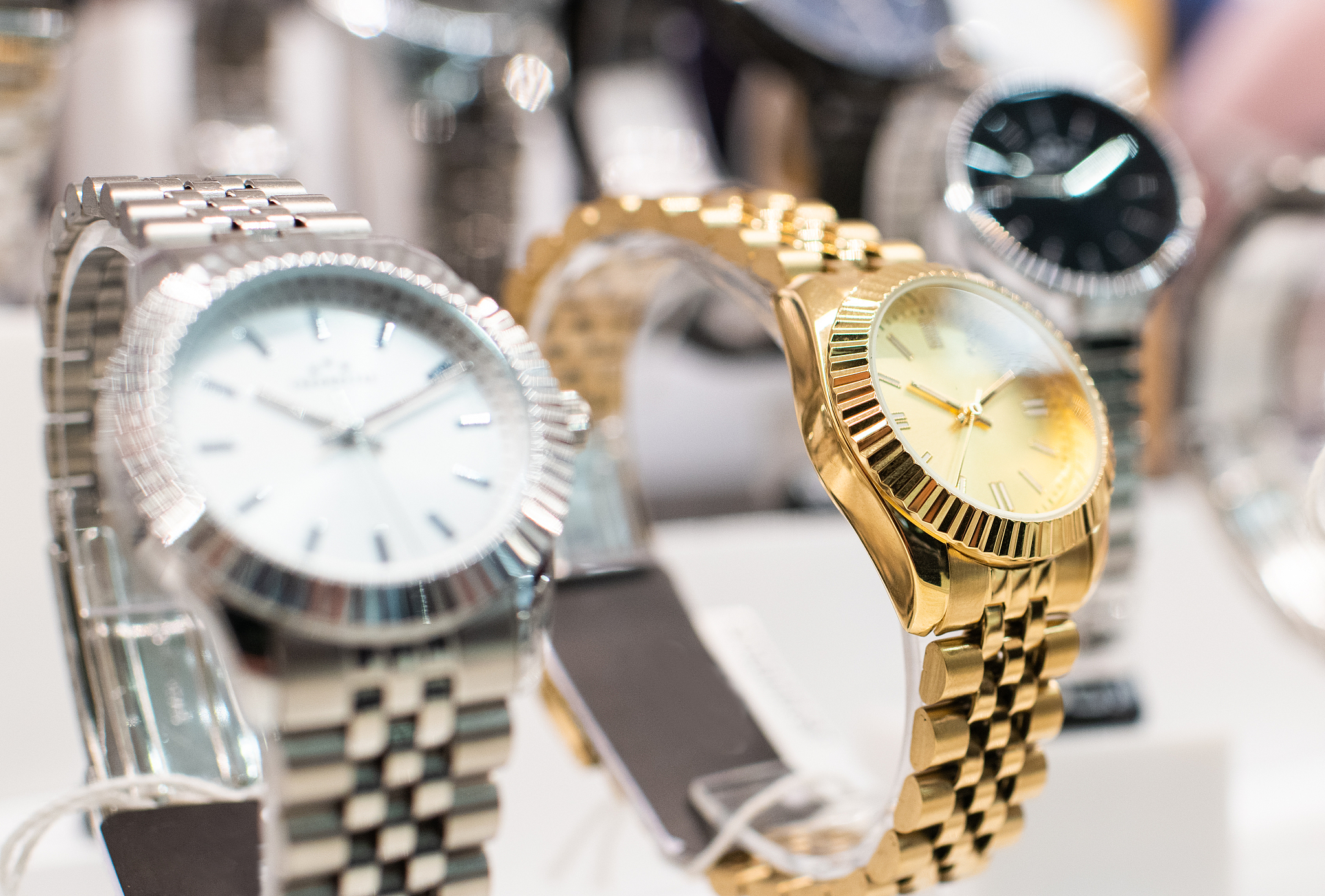 expensive watch is displayed for sale in luxury shop.